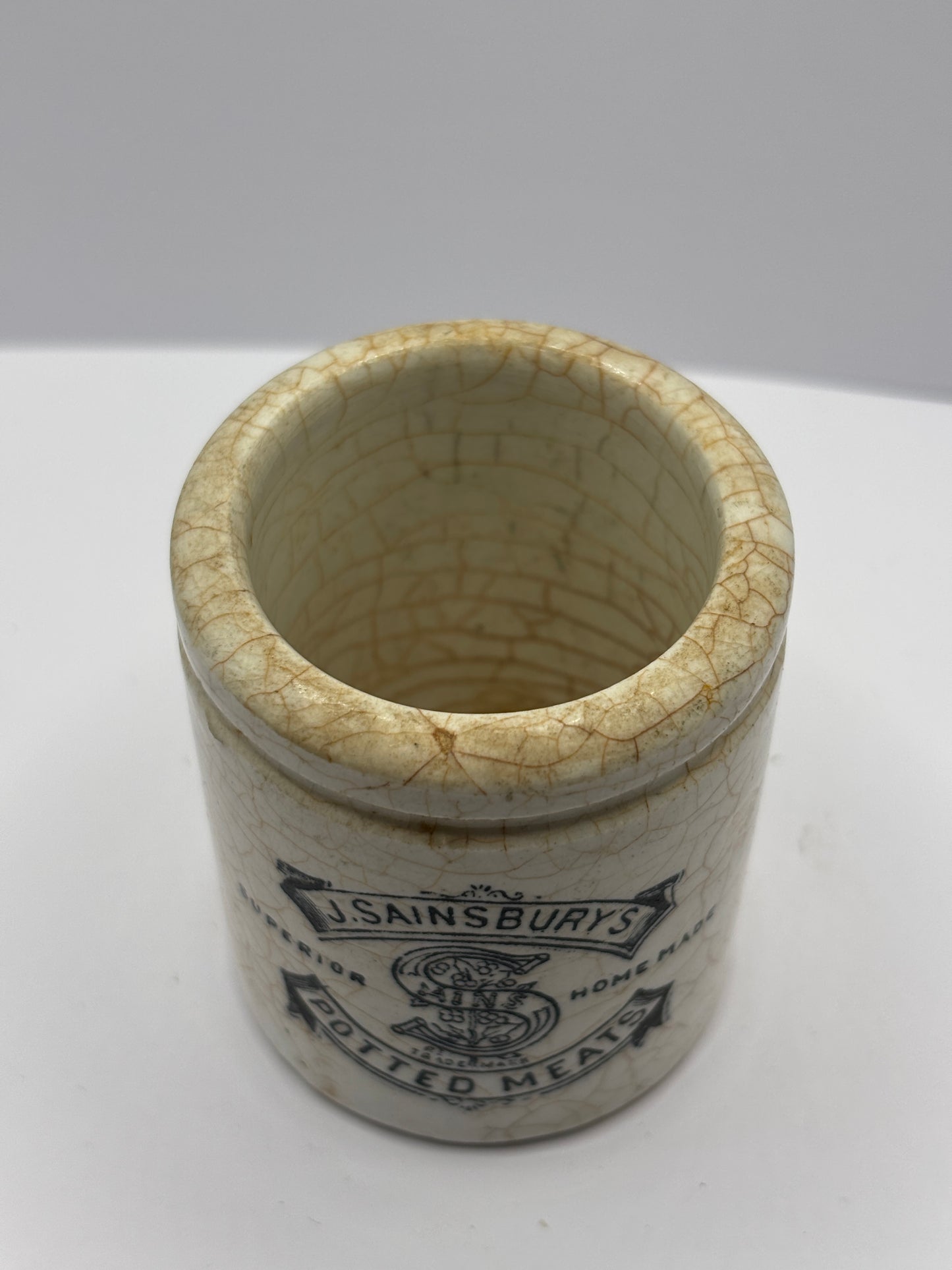 Old stained & crazed sainsburys advertising pot