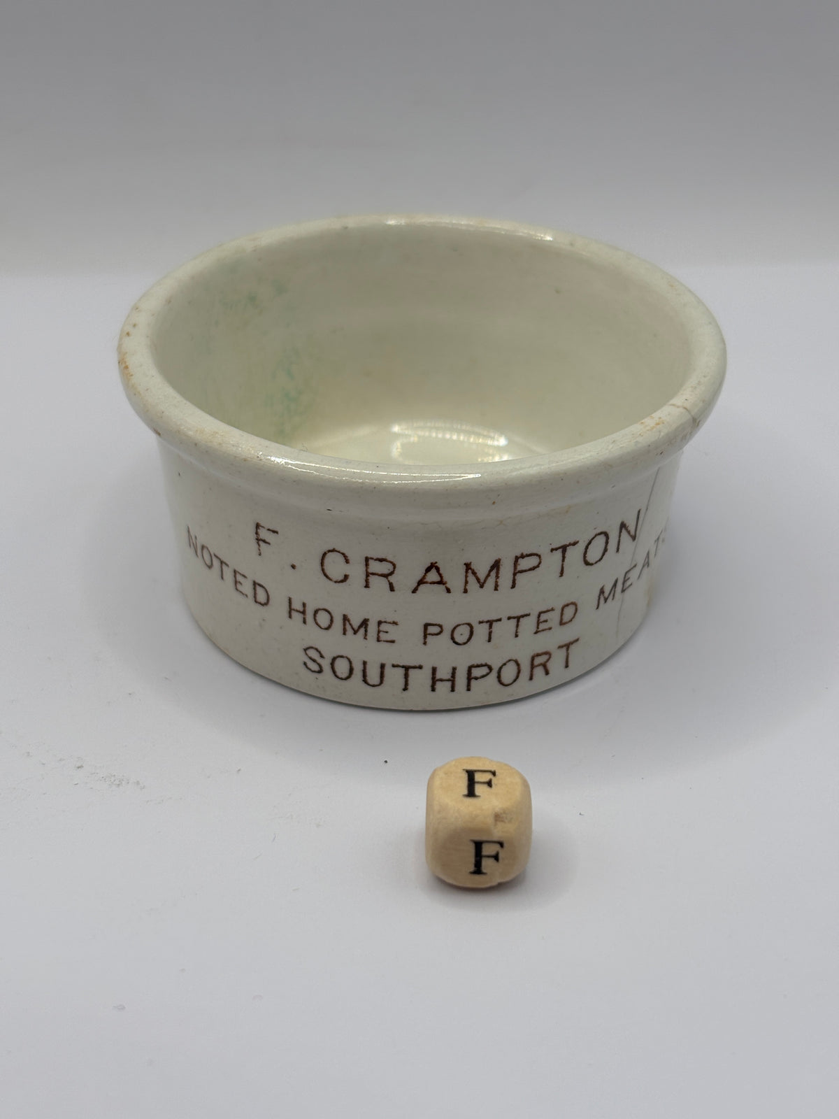 Old small advertising meat paste pot, Cramptons noted home potted meats