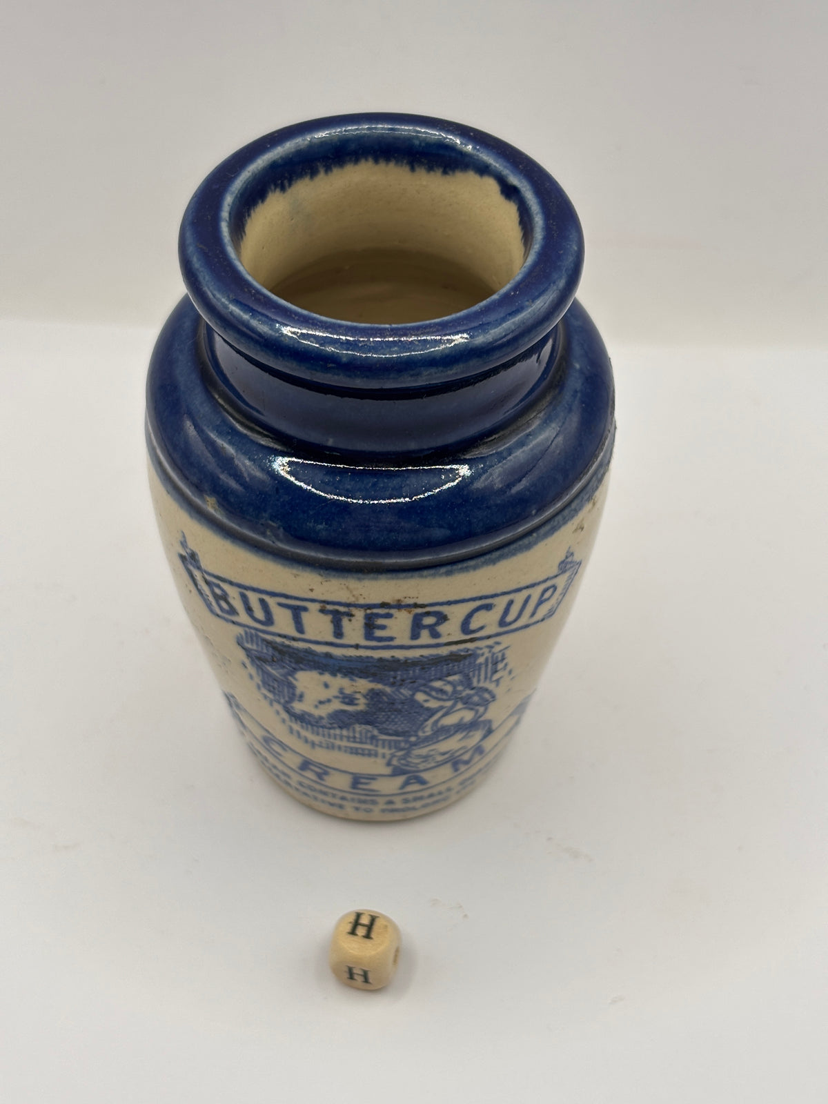 Old blue top advertising cream pot, Buttercup cream, cow & milk maid (H)