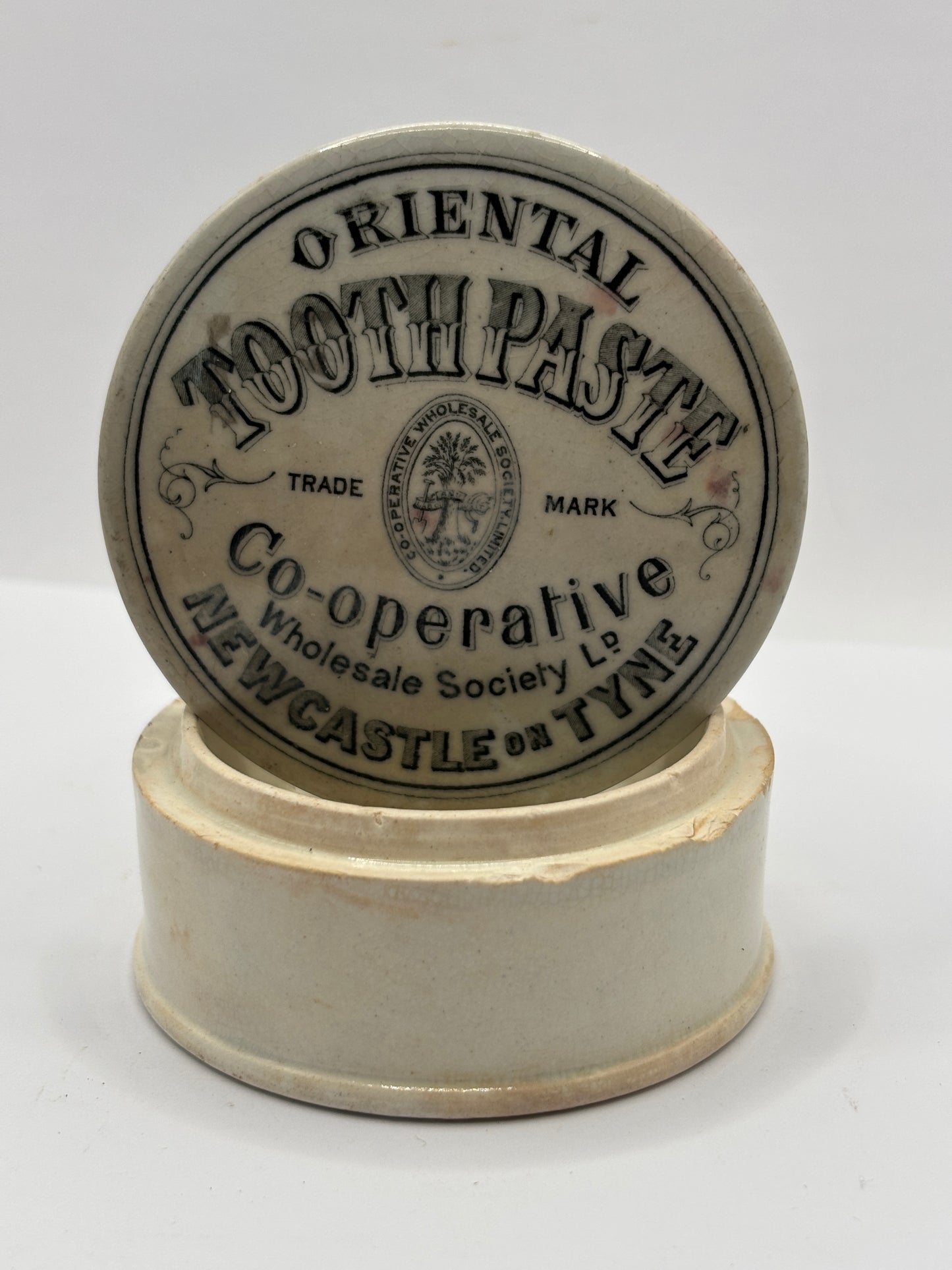 Old advertising lid and base, oriental toothpaste