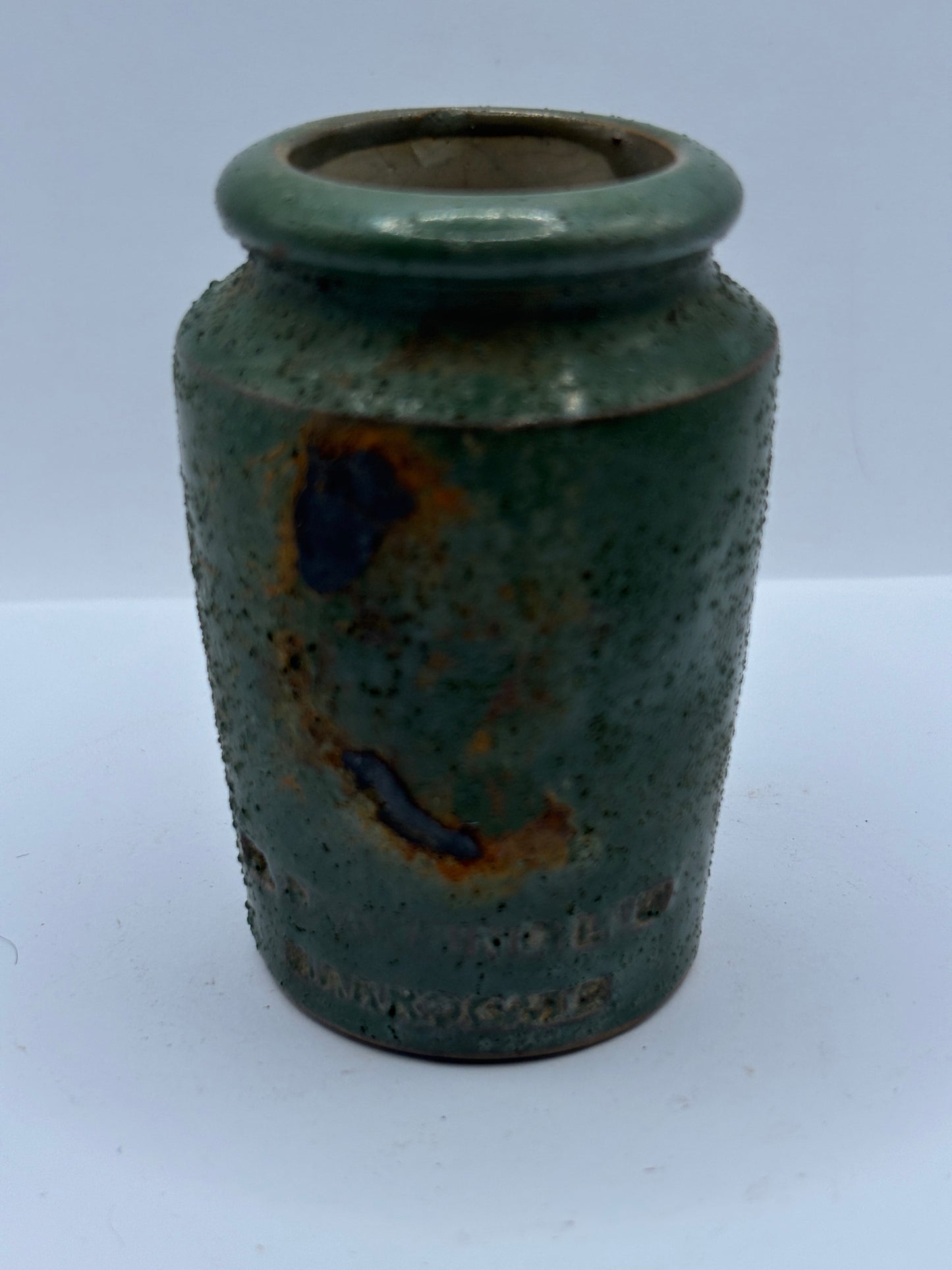 Old crusty green Harrogate cream pot