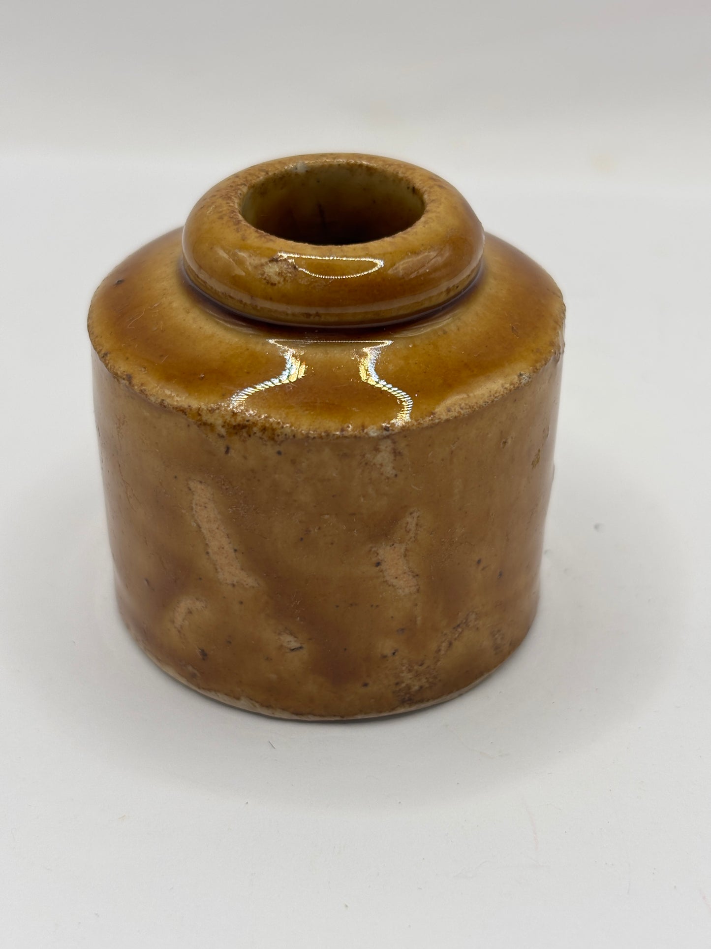 Old brown stoneware inkwell, ink bottle