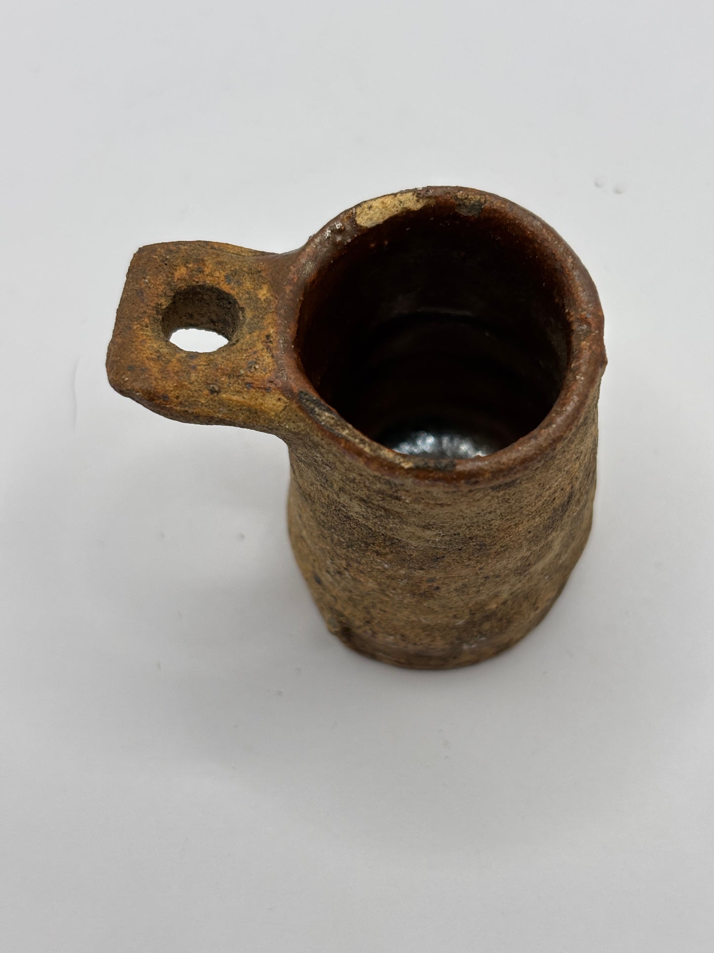 Old stoneware bird feeder