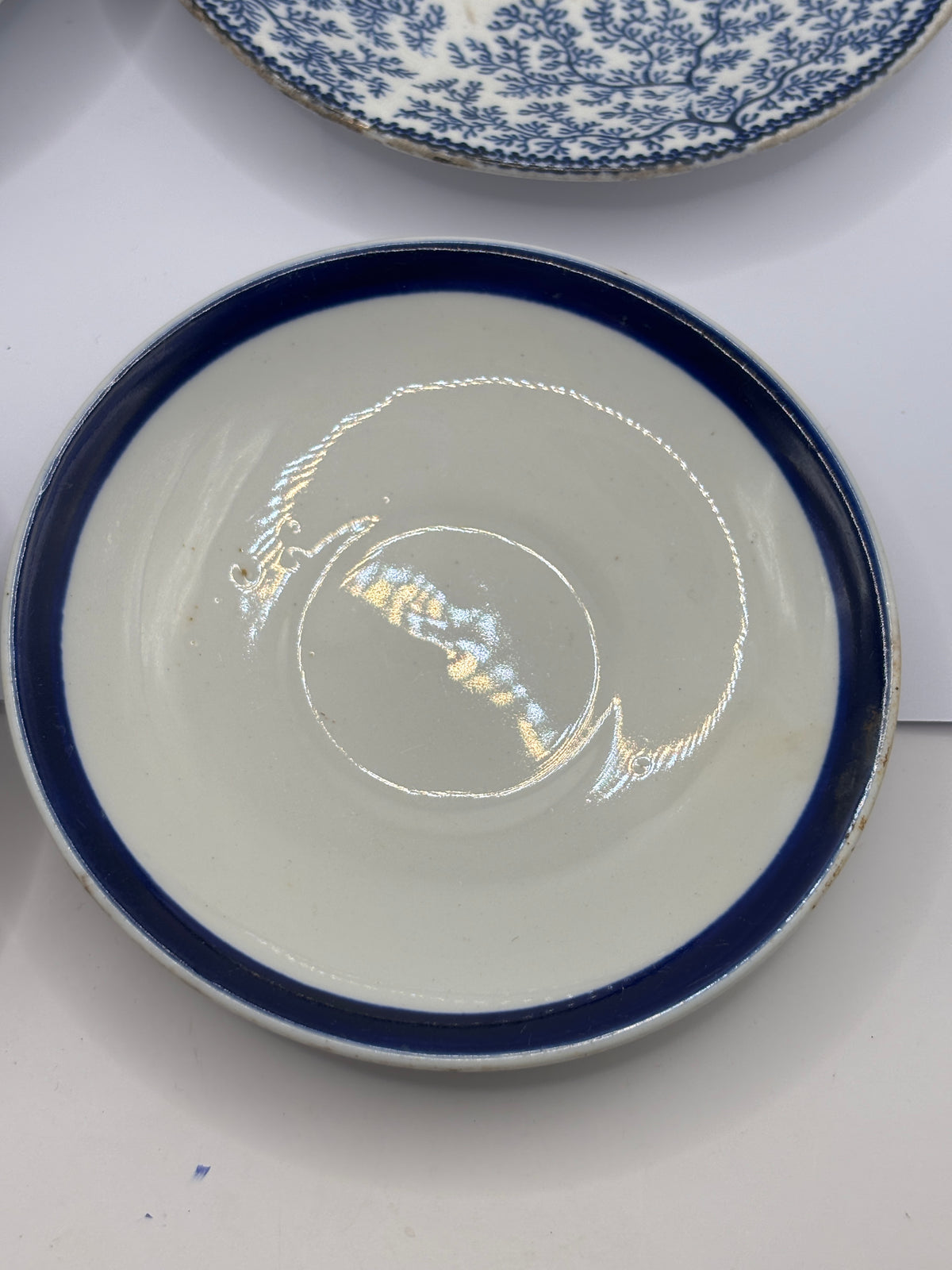4 old decorative saucers (all dump dug)