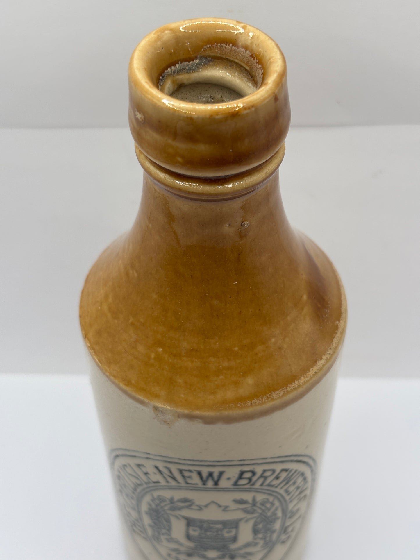 Old stoneware stout bottle, The Carlisle new brewery