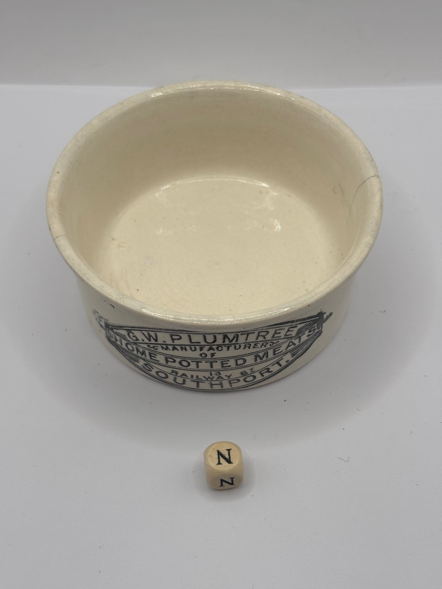 Old advertising meat paste pot, plumtrees (N) damaged