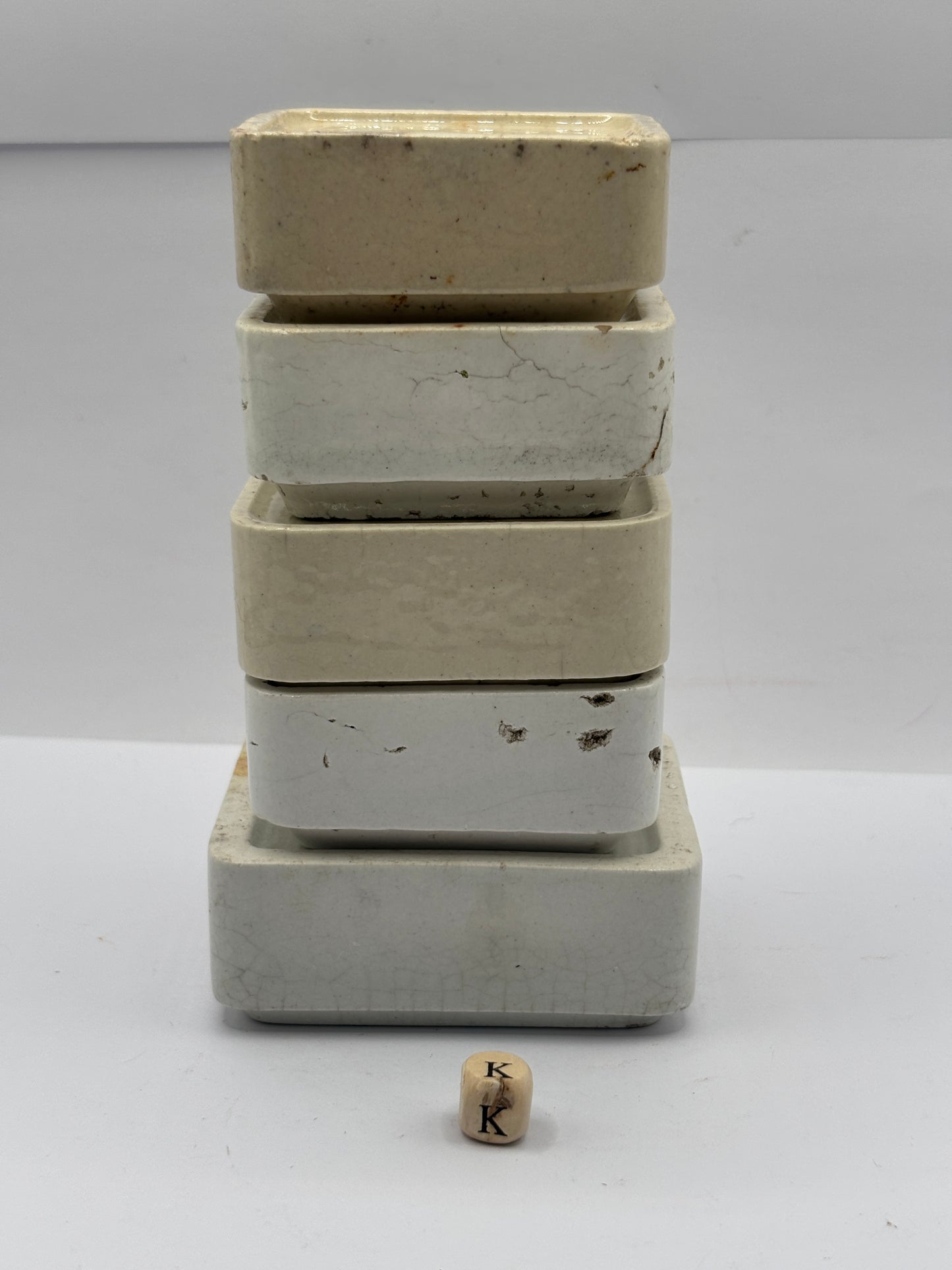 5 old square bases, stackers (K) damages