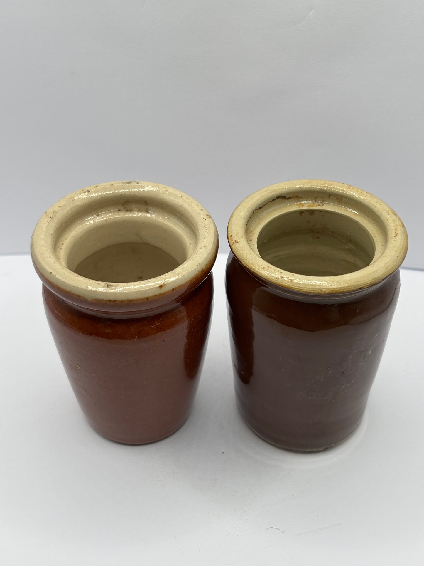 2 old brown stoneware cream pots