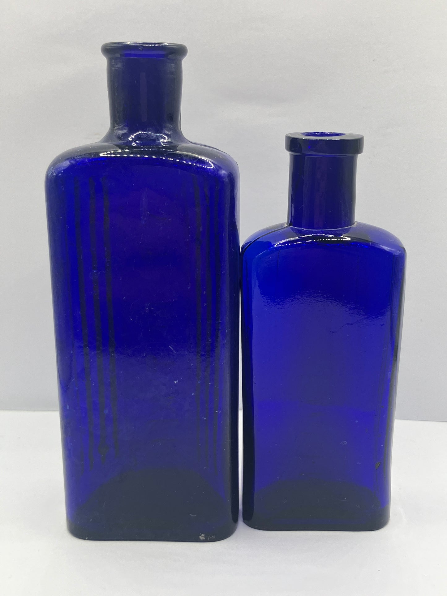 2 blue ribbed poison bottles, Not to be taken