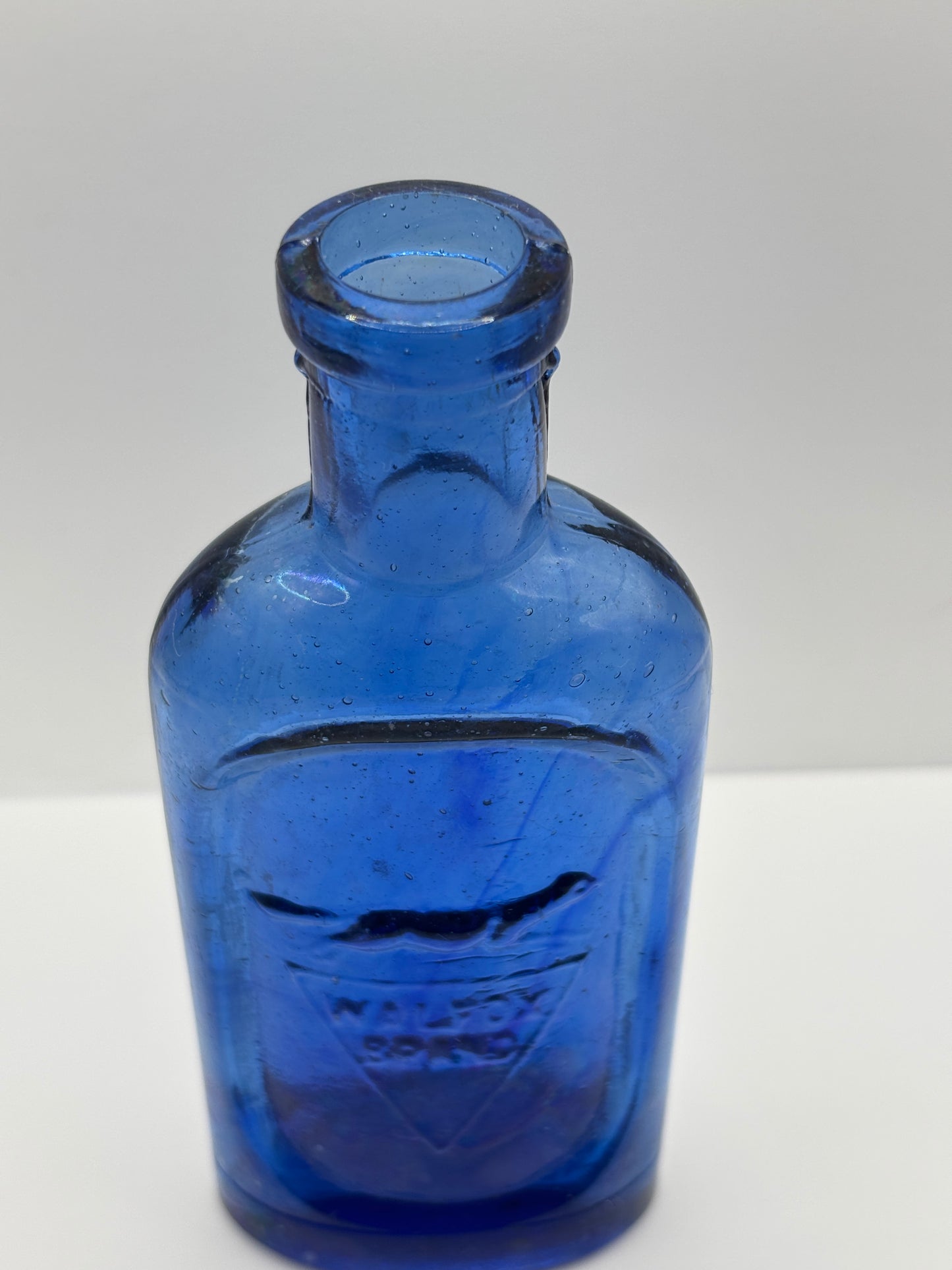 Old blue glass advertising chemist bottle, walfox brand
