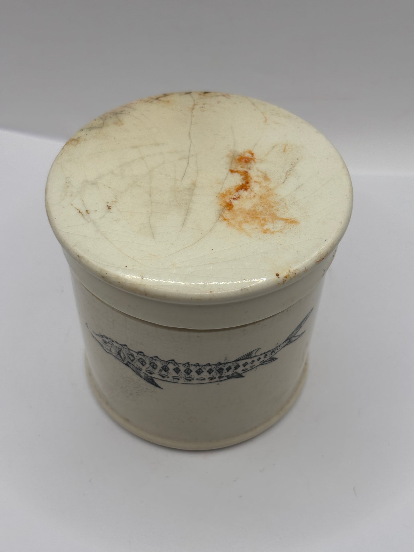 Old stoneware caviar jar and lid. Chipped