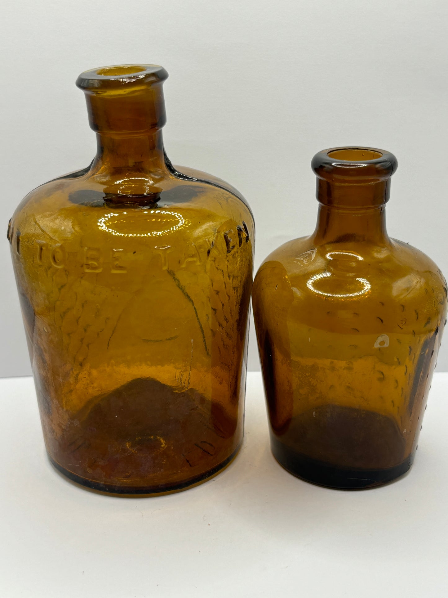 2 amber glass lysol bottles