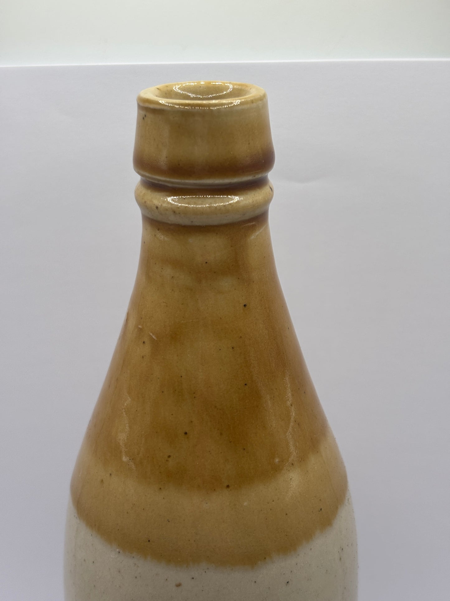 Old plain stoneware ginger beer bottle (B)