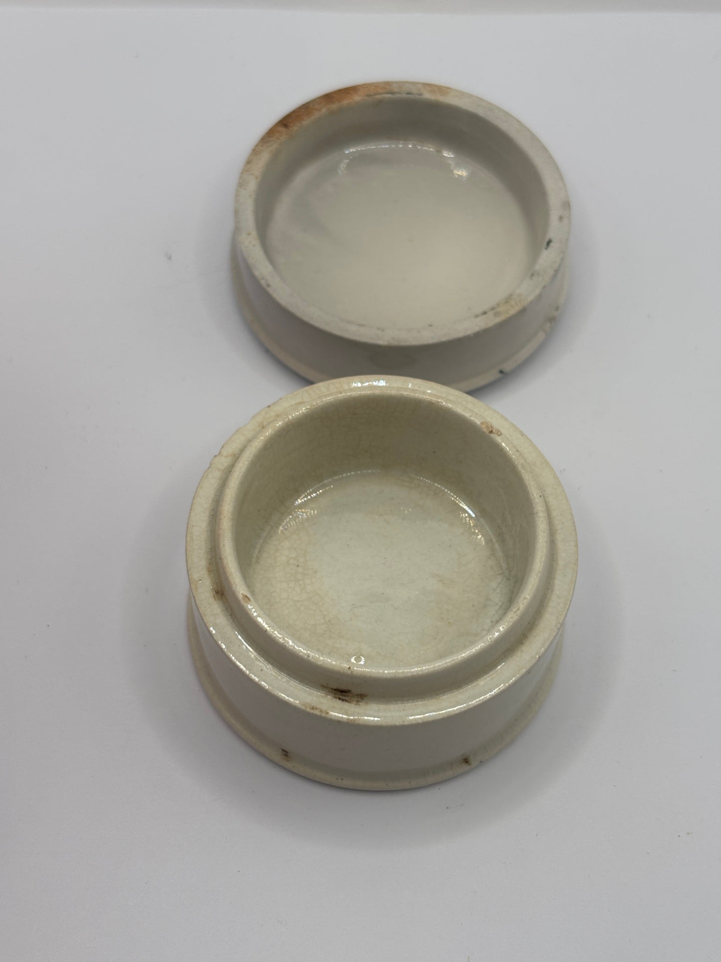 Old advertising lid and base. Woods areca nut tooth paste