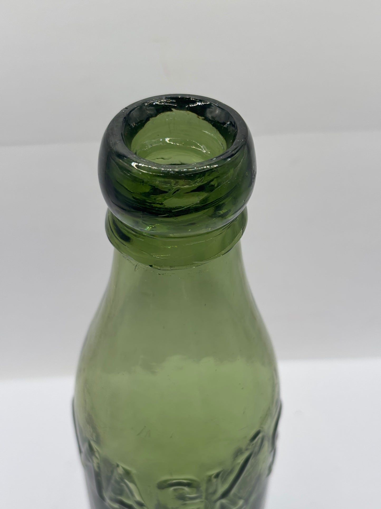 Old advertising green glass beer bottle, Macks Manchester
