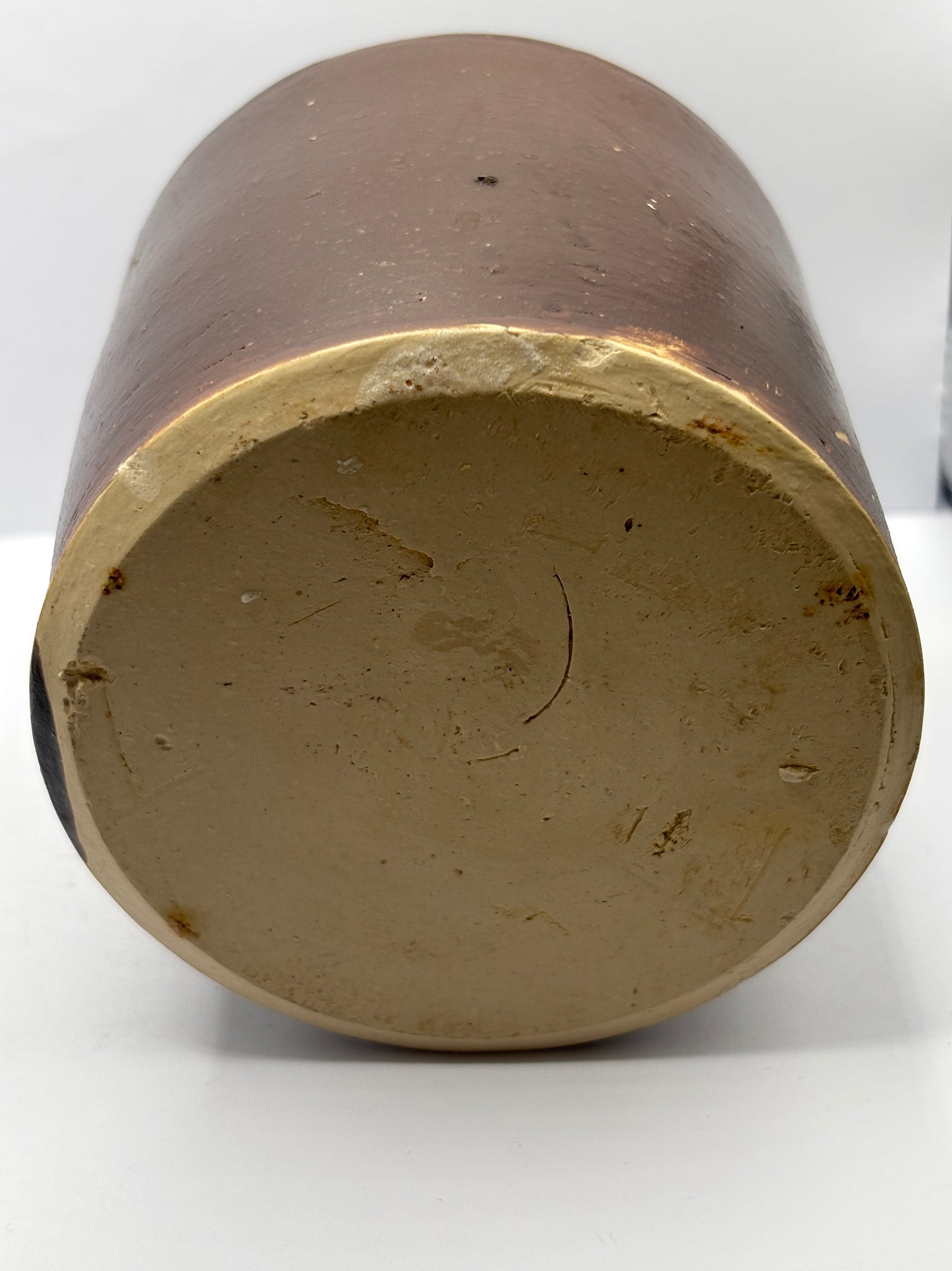 Old brown stoneware jar