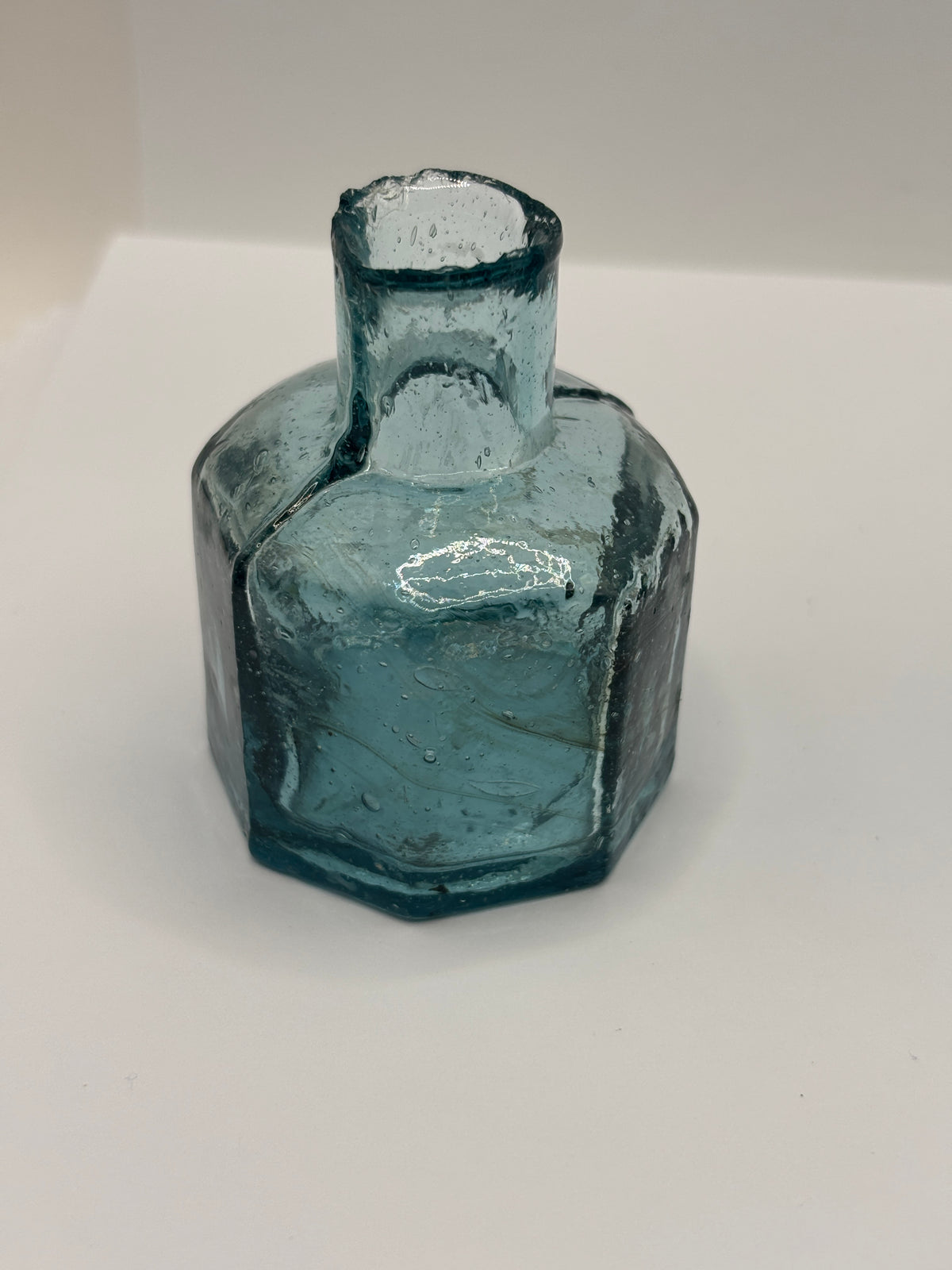 Old blue glass inkwell, ink bottle, penny ink with swirls