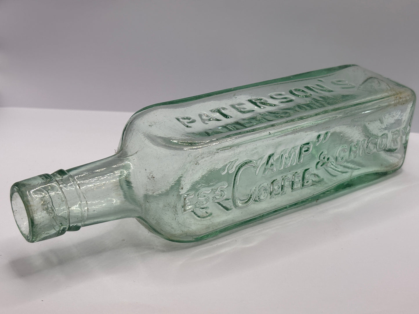 Old camp coffee advertising bottle