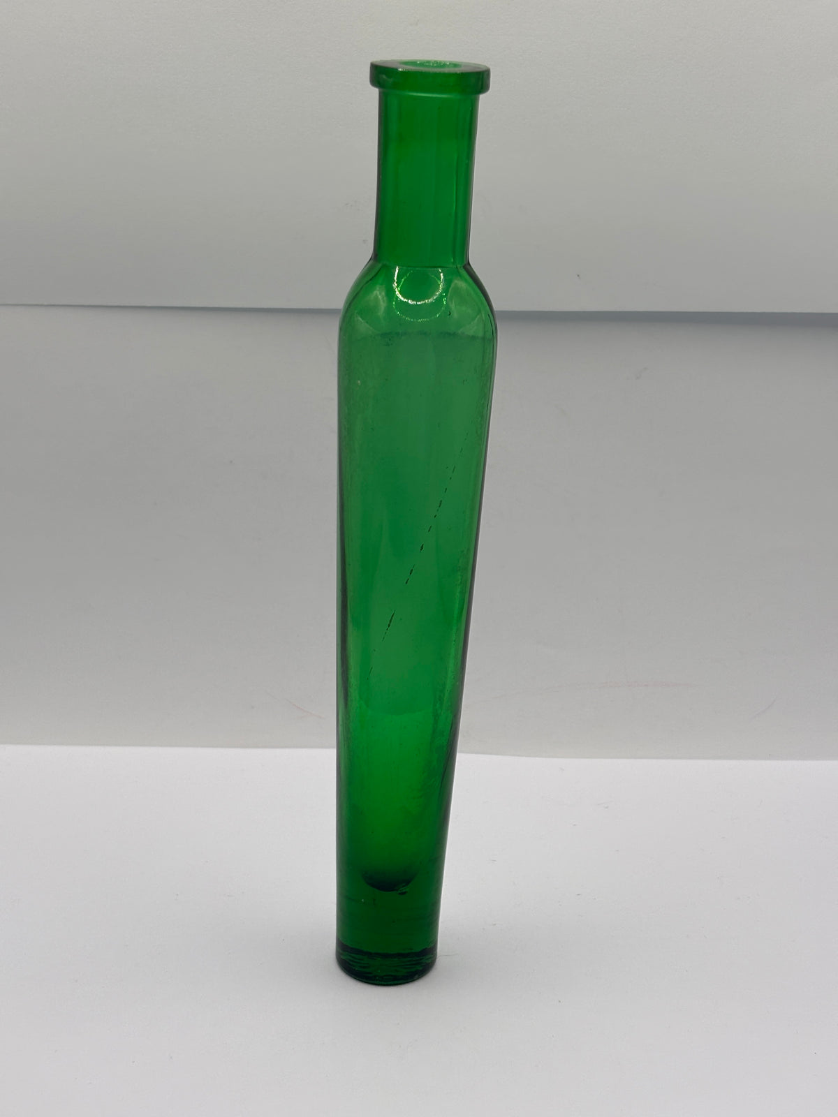 old tall green glass lavender water bottle