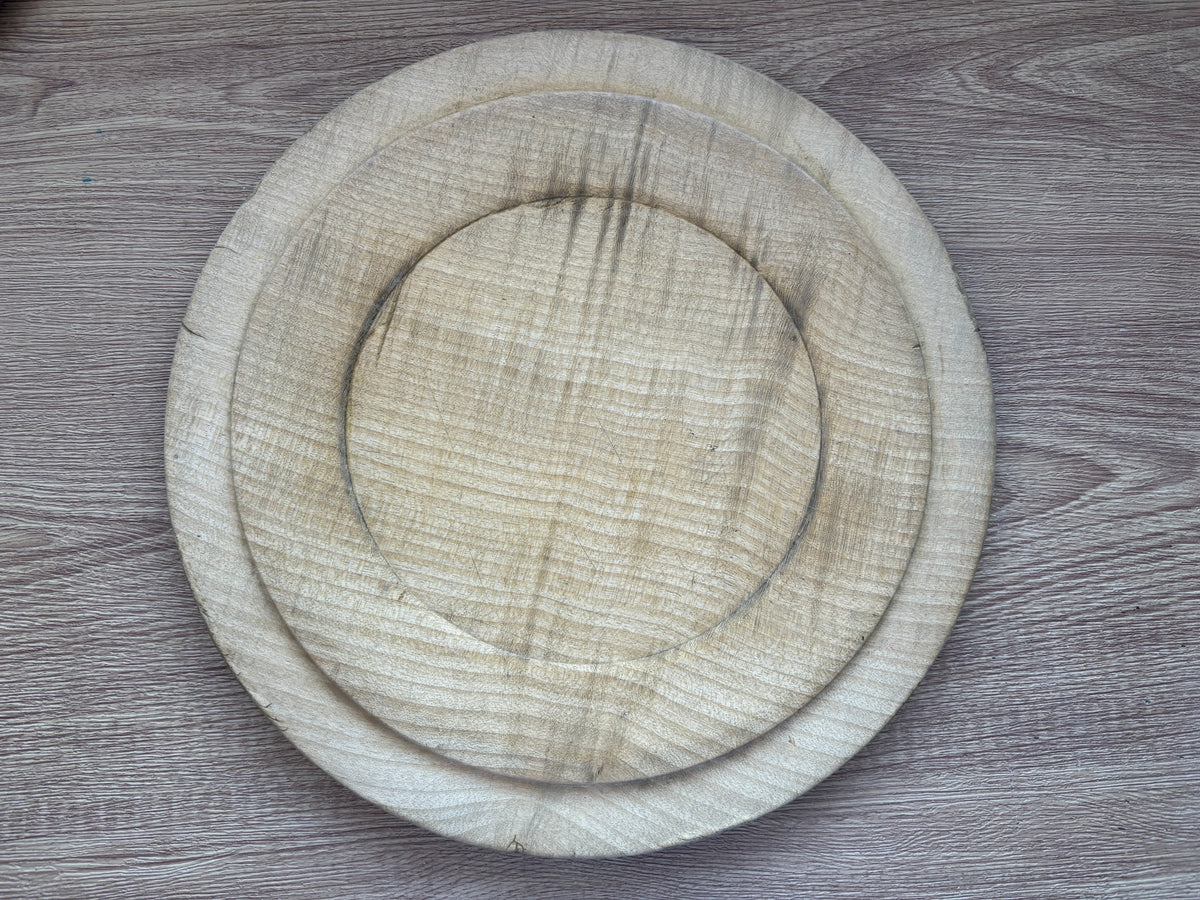 Old wooden carved bread board