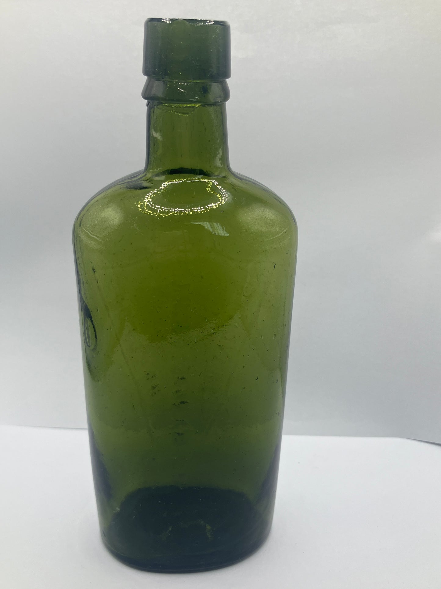 Dark green Bradford chemist bottle