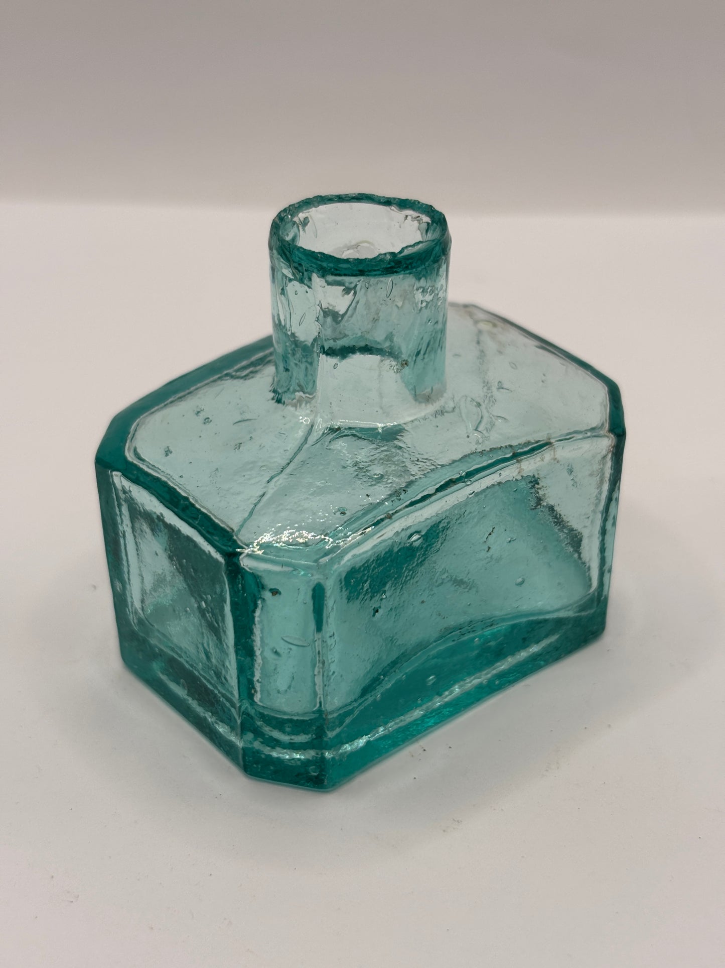 Old aqua glass inkwell, ink bottle