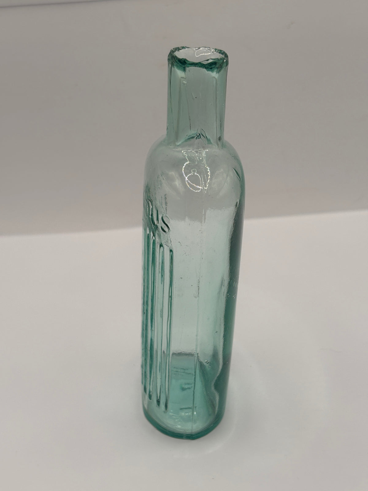 Old aqua glass poison bottle, POISONOUS Not to be taken