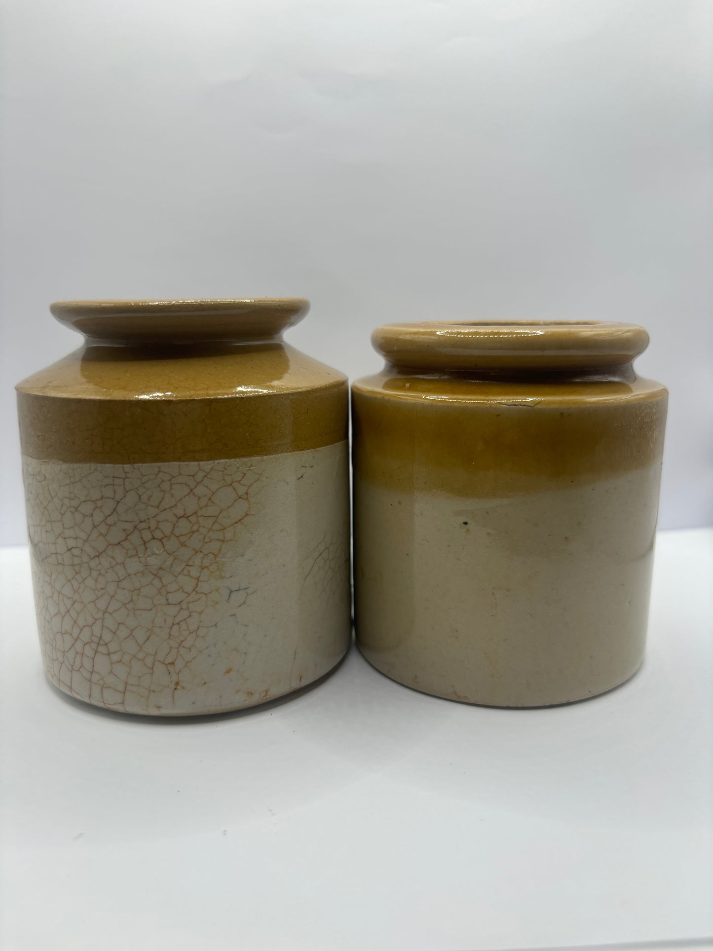 2 small stoneware jars