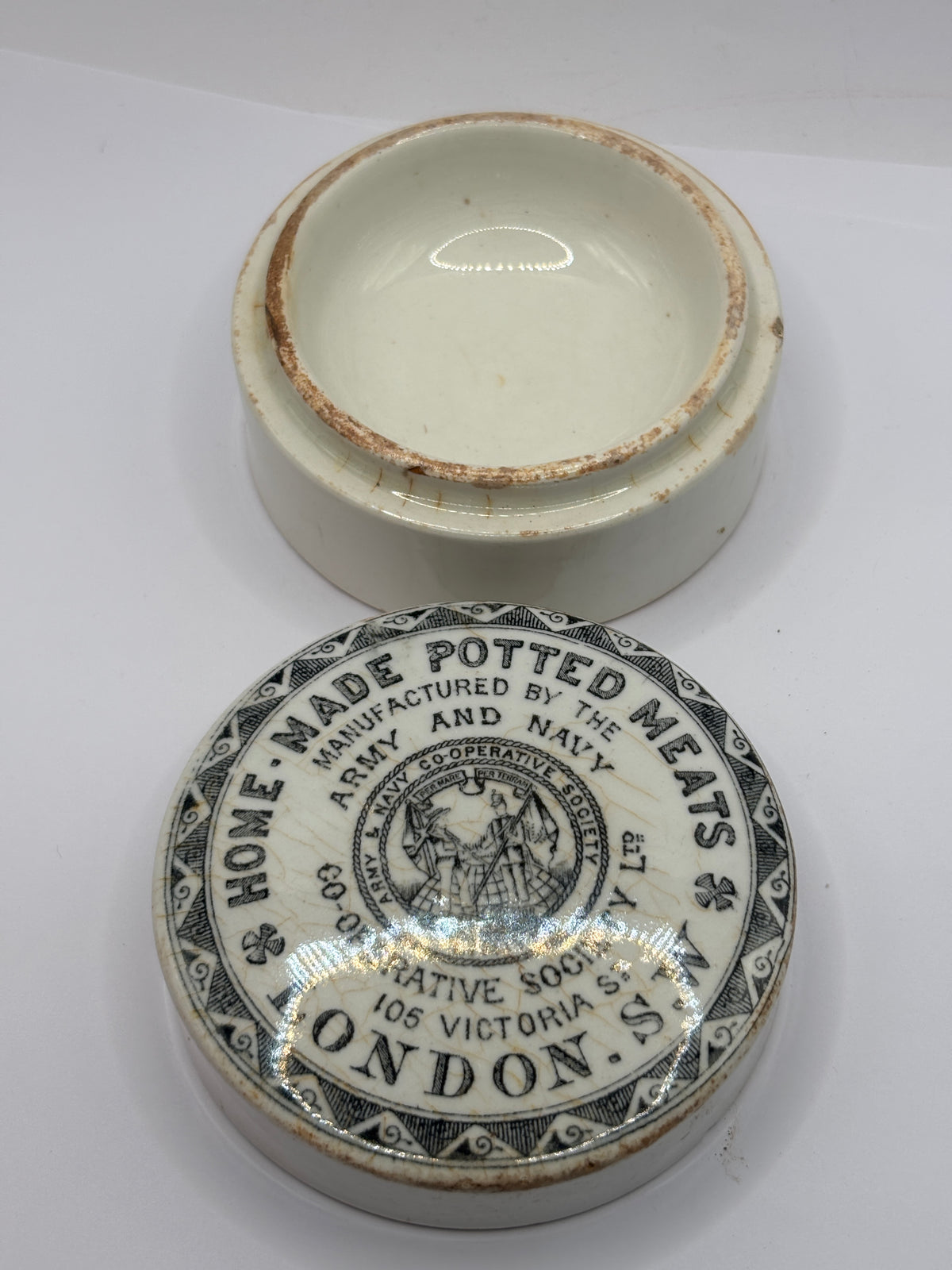 Old advertising lid and base. Army & Navy cooperative society home made potted meats