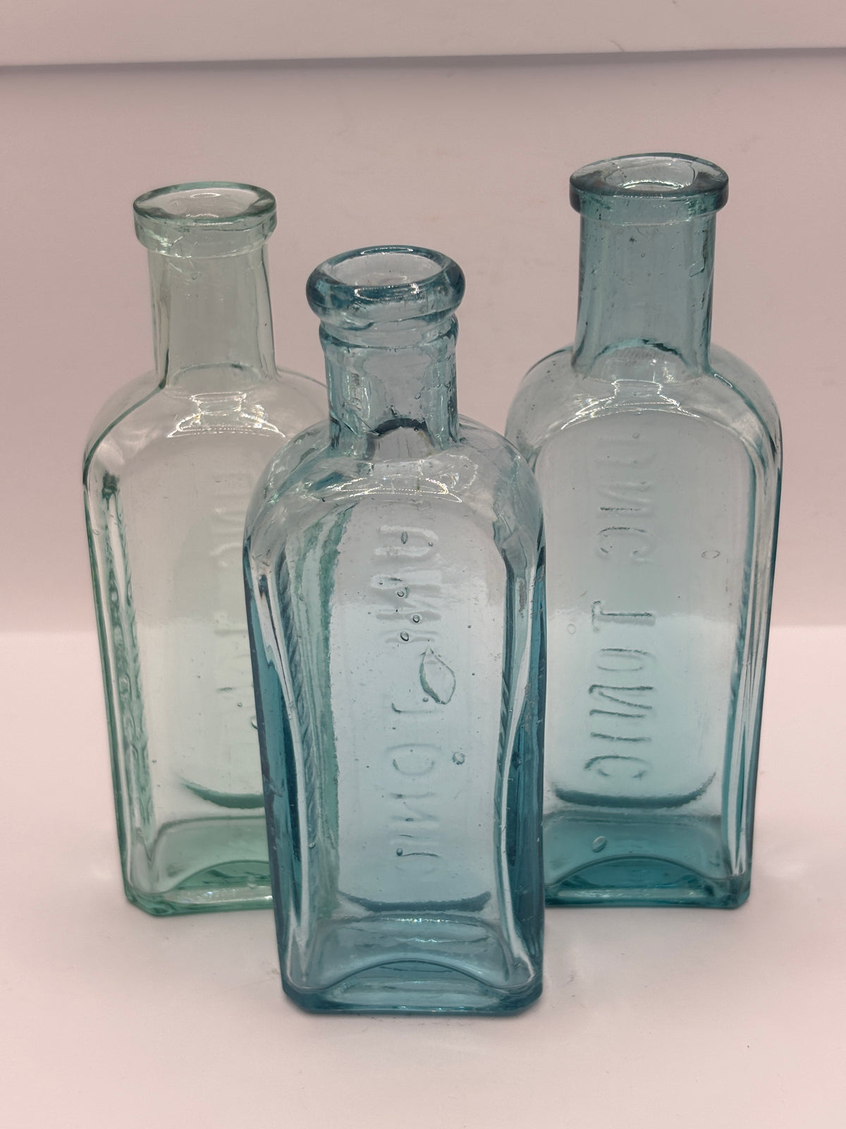 2 old aqua glass Lung tonic bottles