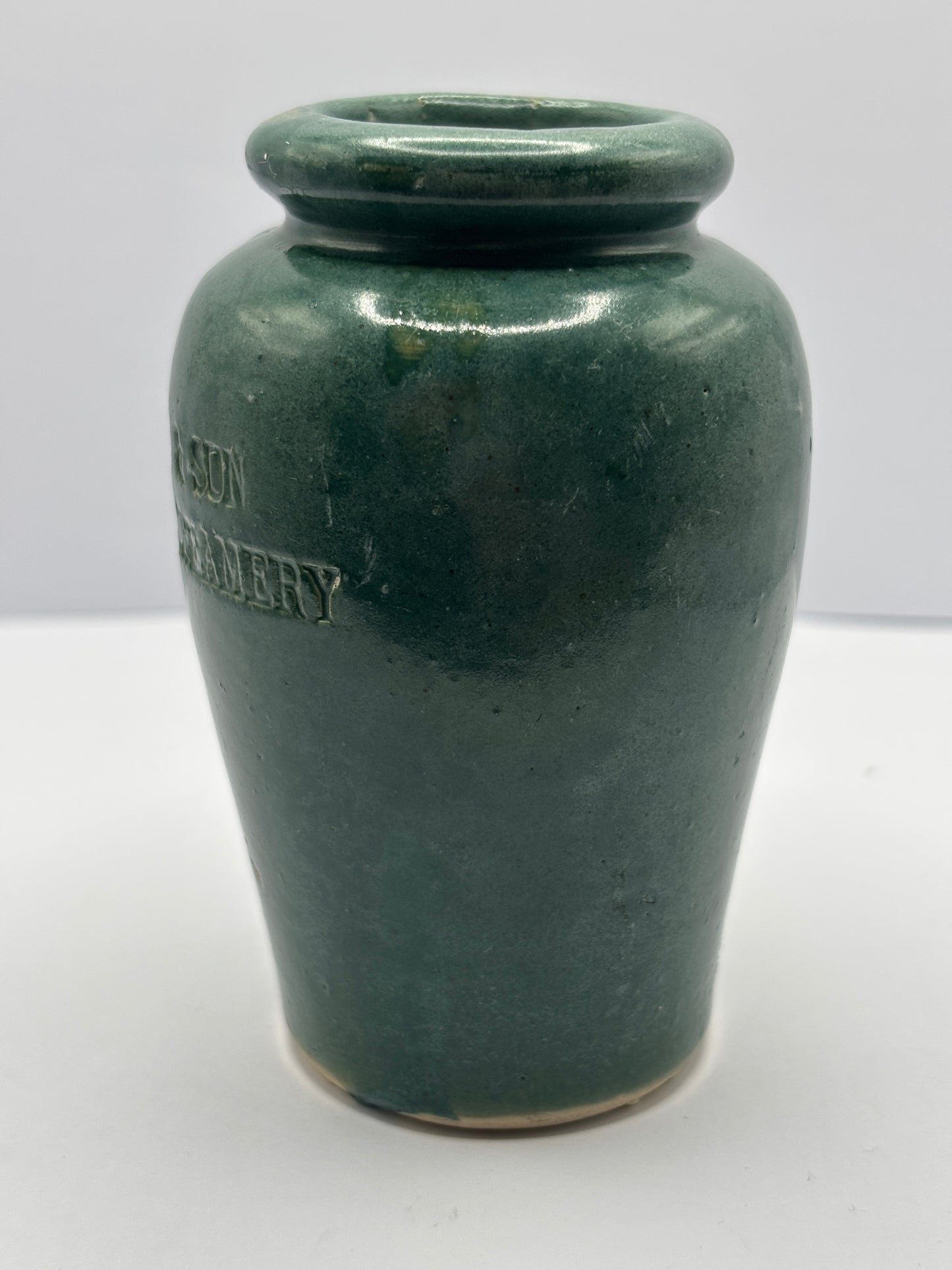 Old green stoneware cream pot. The Buxton creamery, R.B Morten & son