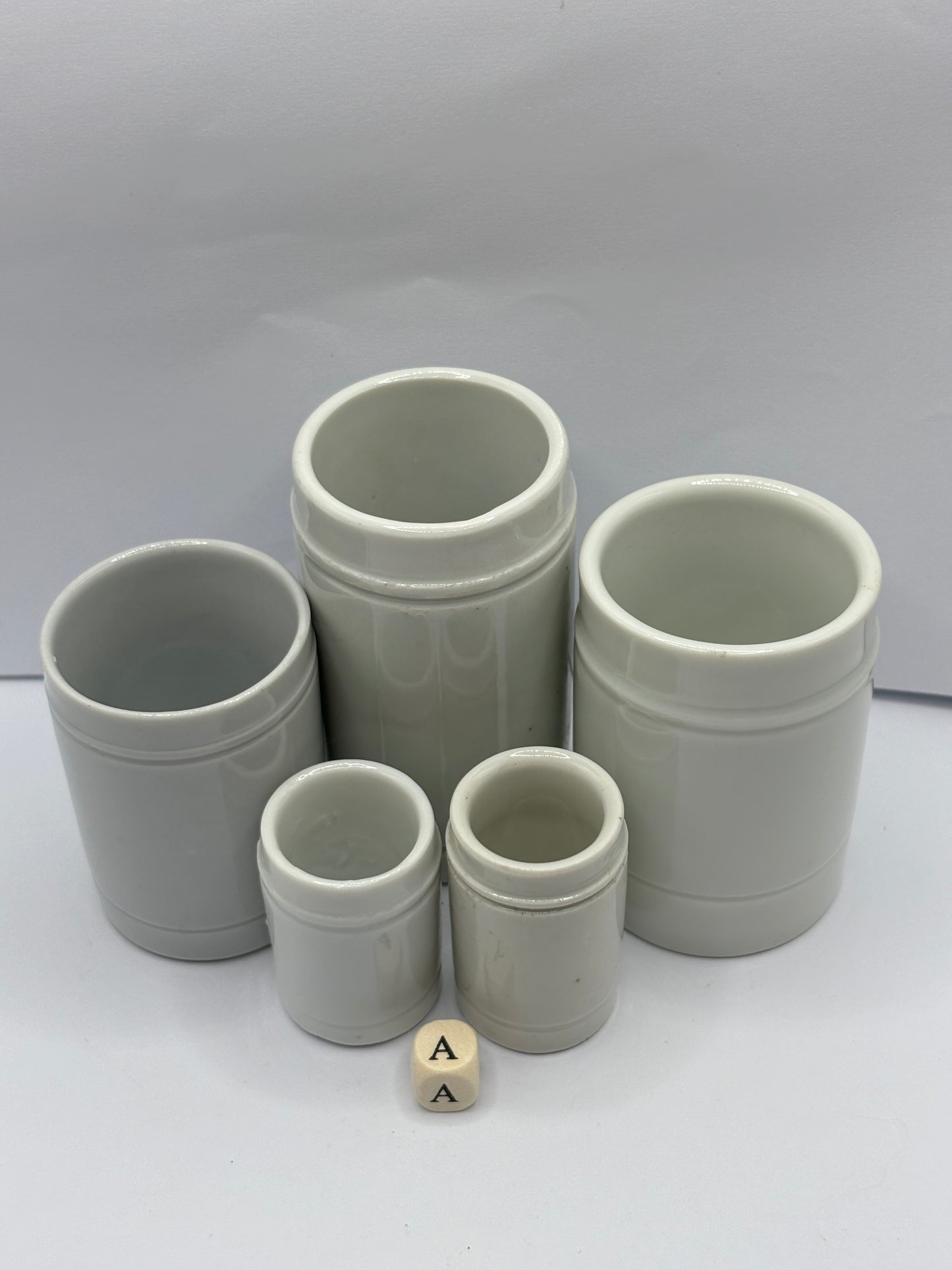 5 small white stoneware pots (A)