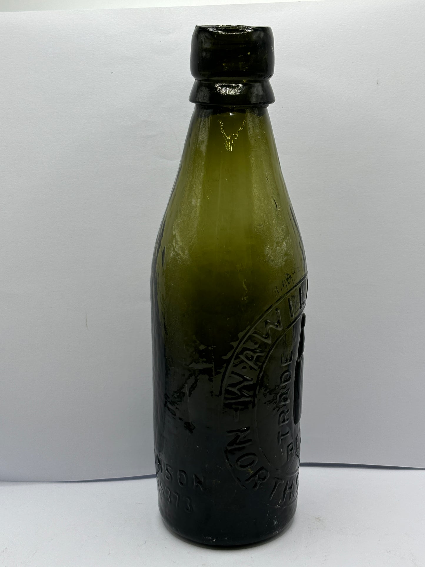 Old green glass North Sheilds beer bottle