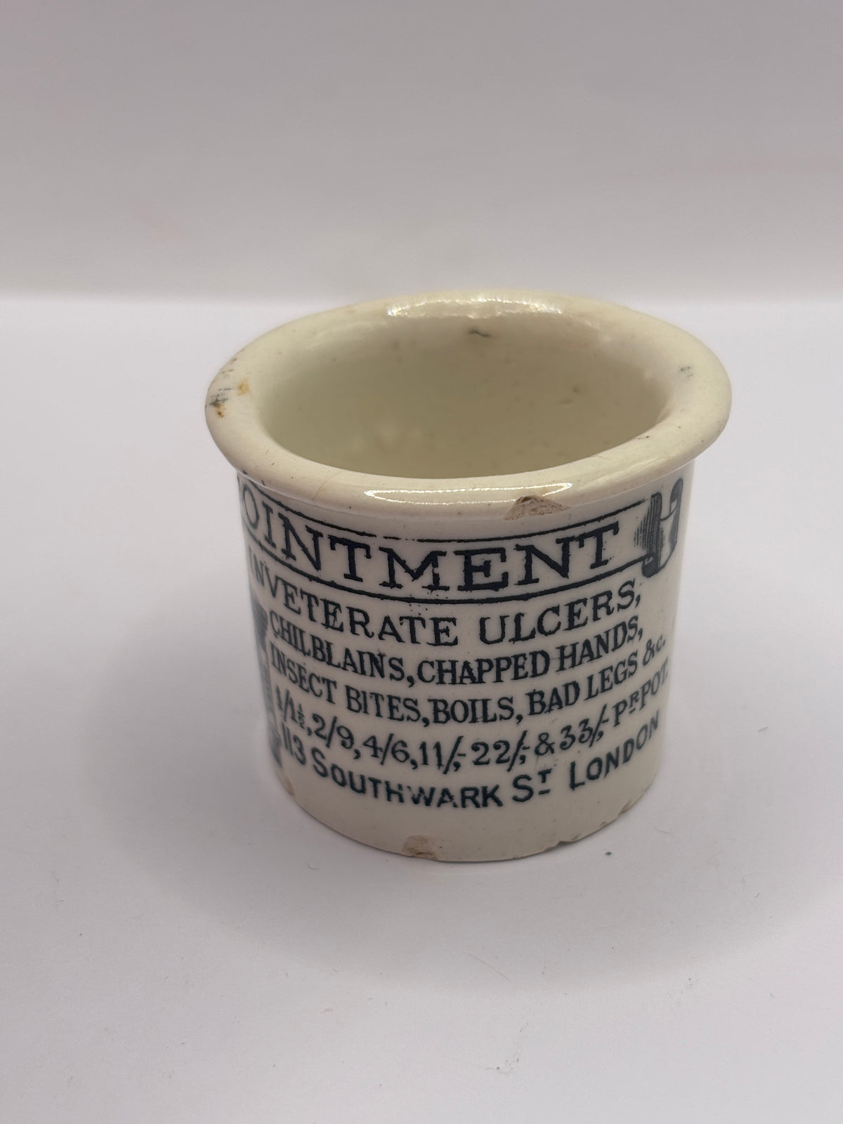 Old advertising ointment pot, Holloways ointment. Small chip