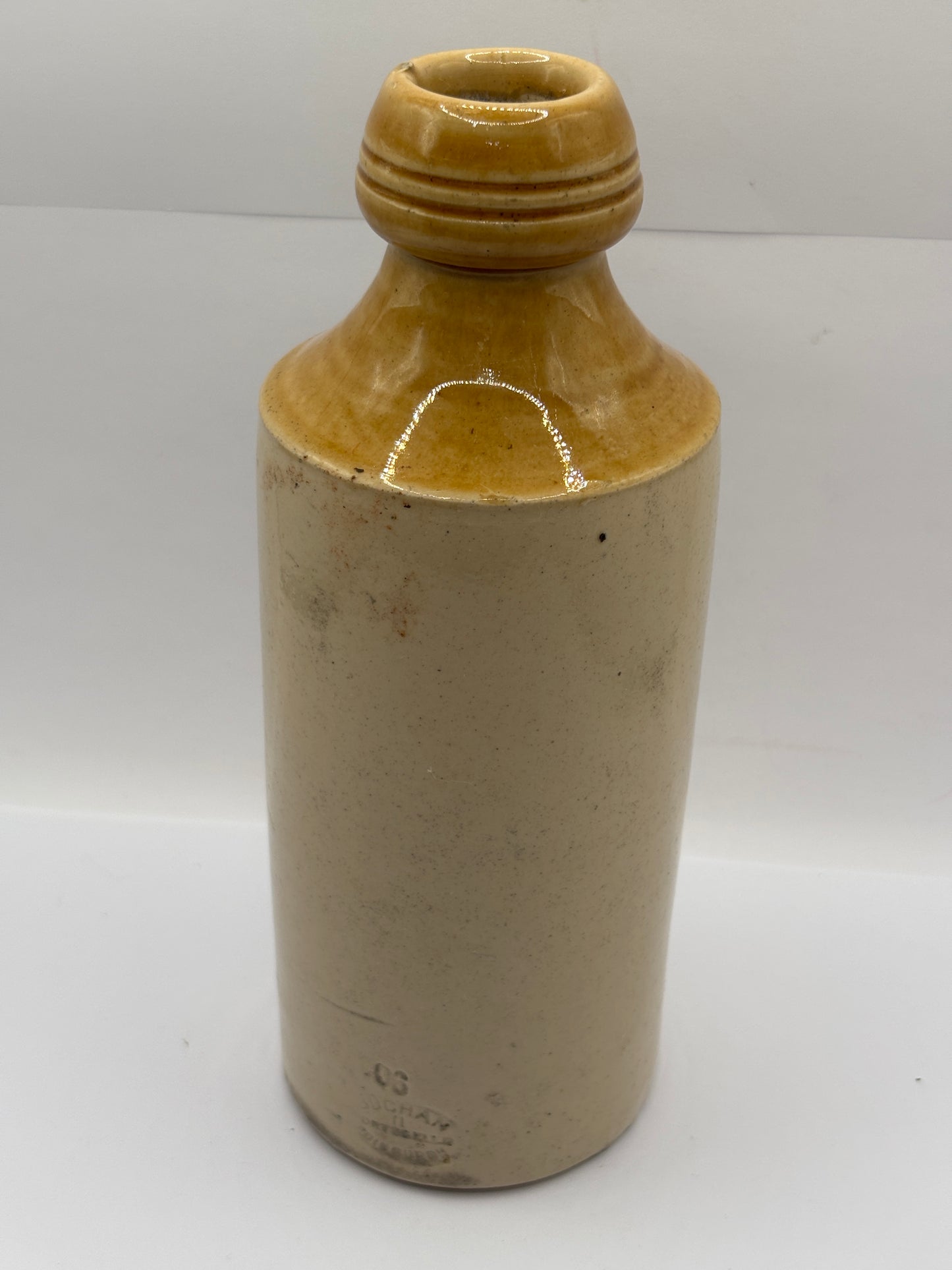 Old stoneware ginger beer bottle, W.G Johnstone chemists Dumfries