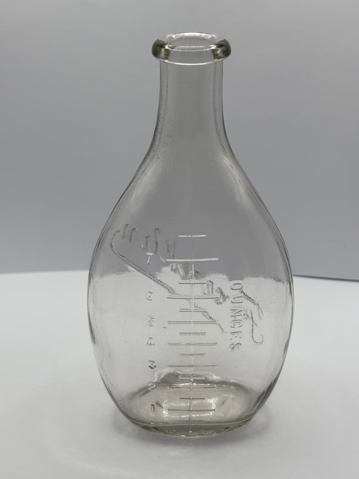 Old clear glass baby feeder. Franklin