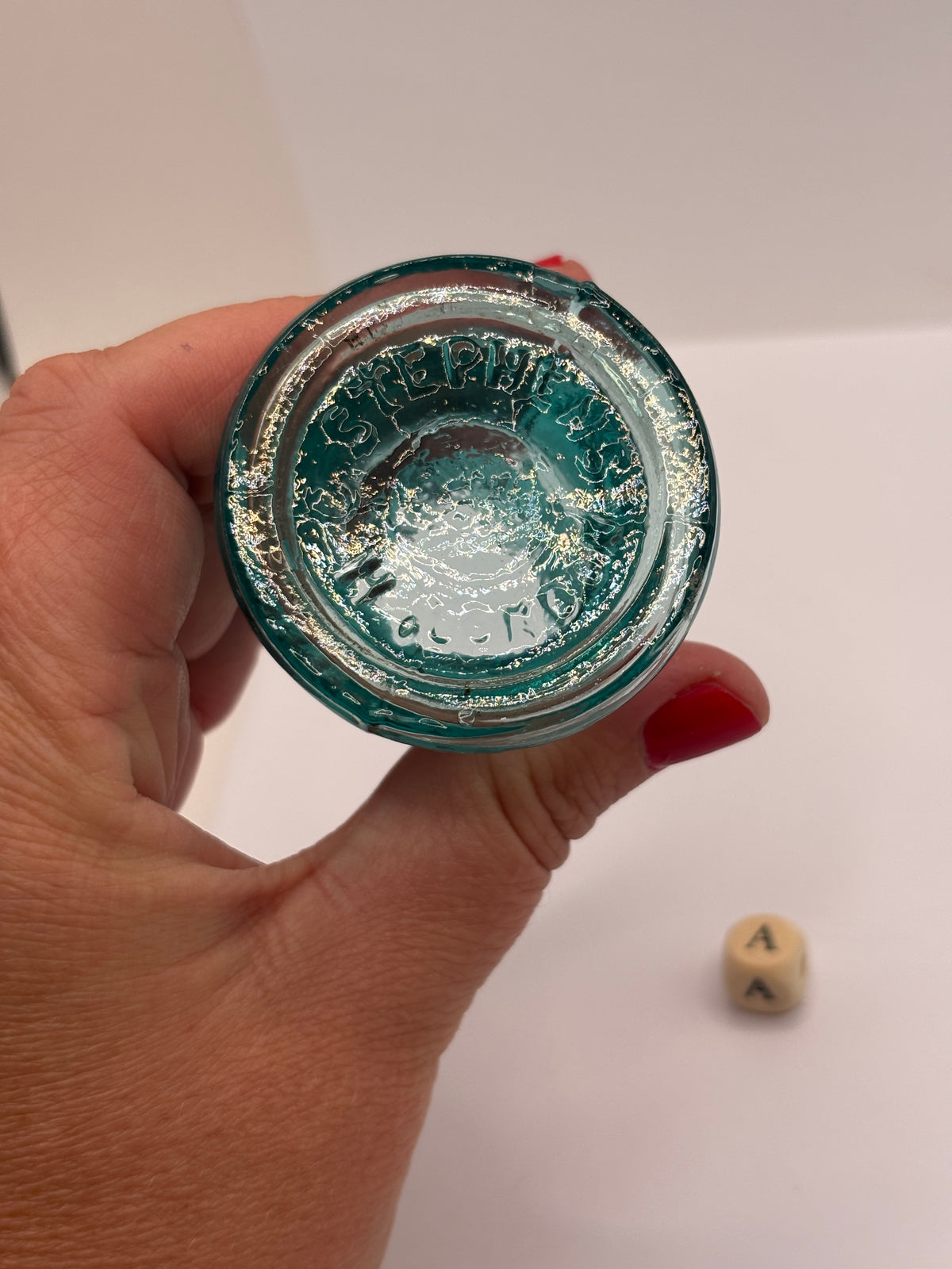 Old aqua glass inkwell, Bell ink. Ink bottle (a) Stephens ink