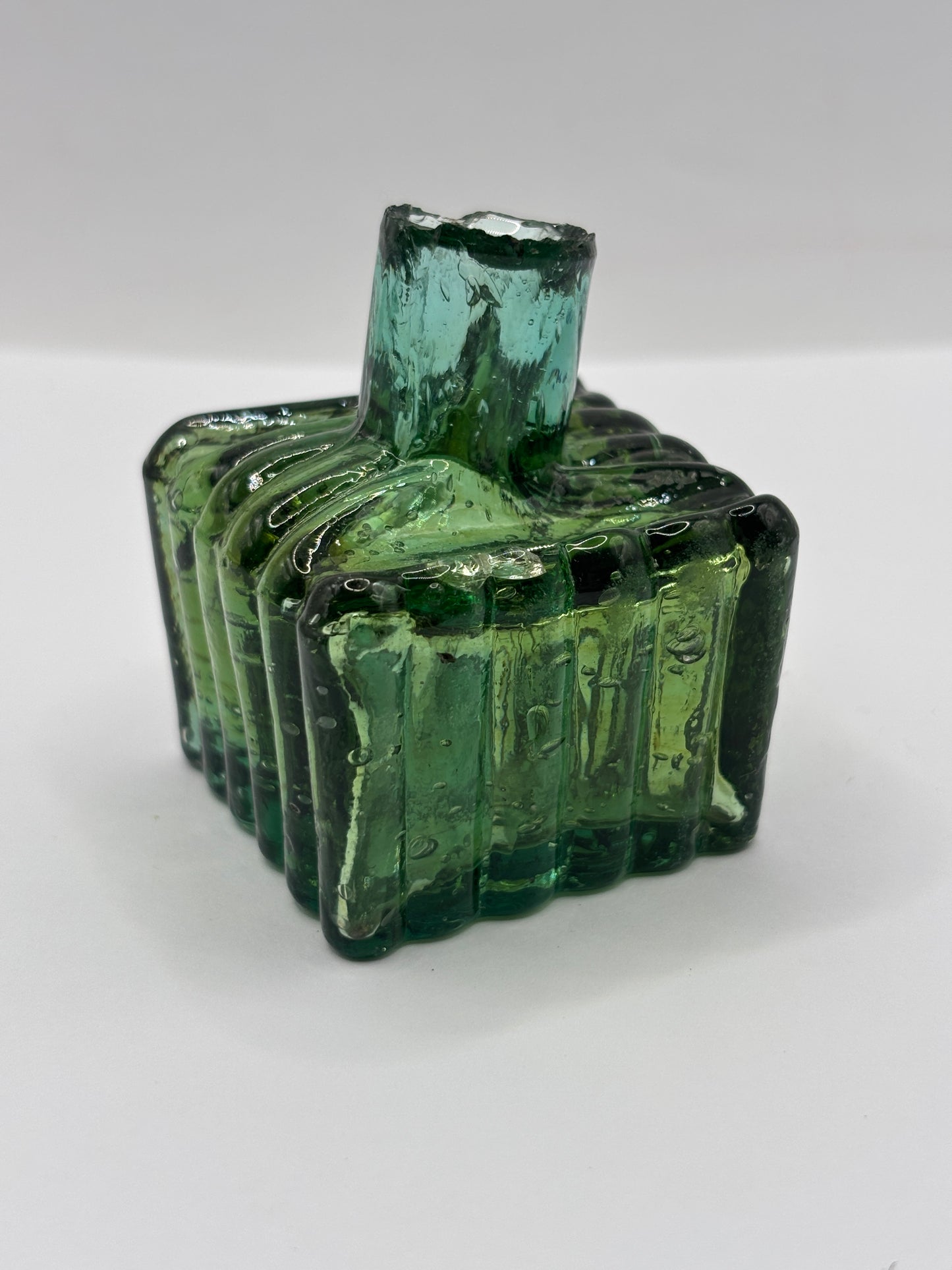 Old green glass ribbed inkwell, ink bottle, penny ink