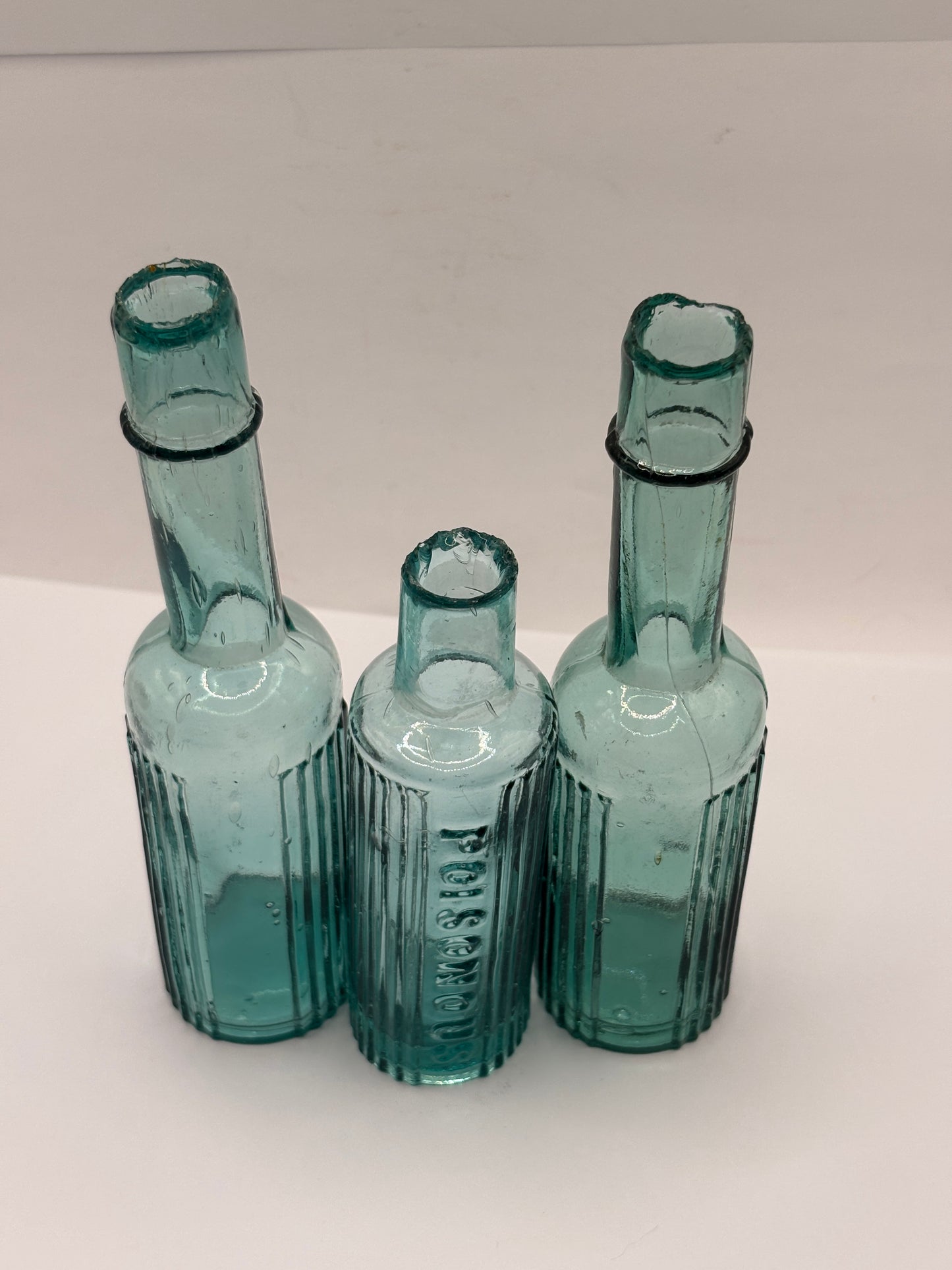 3 Old aqua glass poison bottles, poisonous
