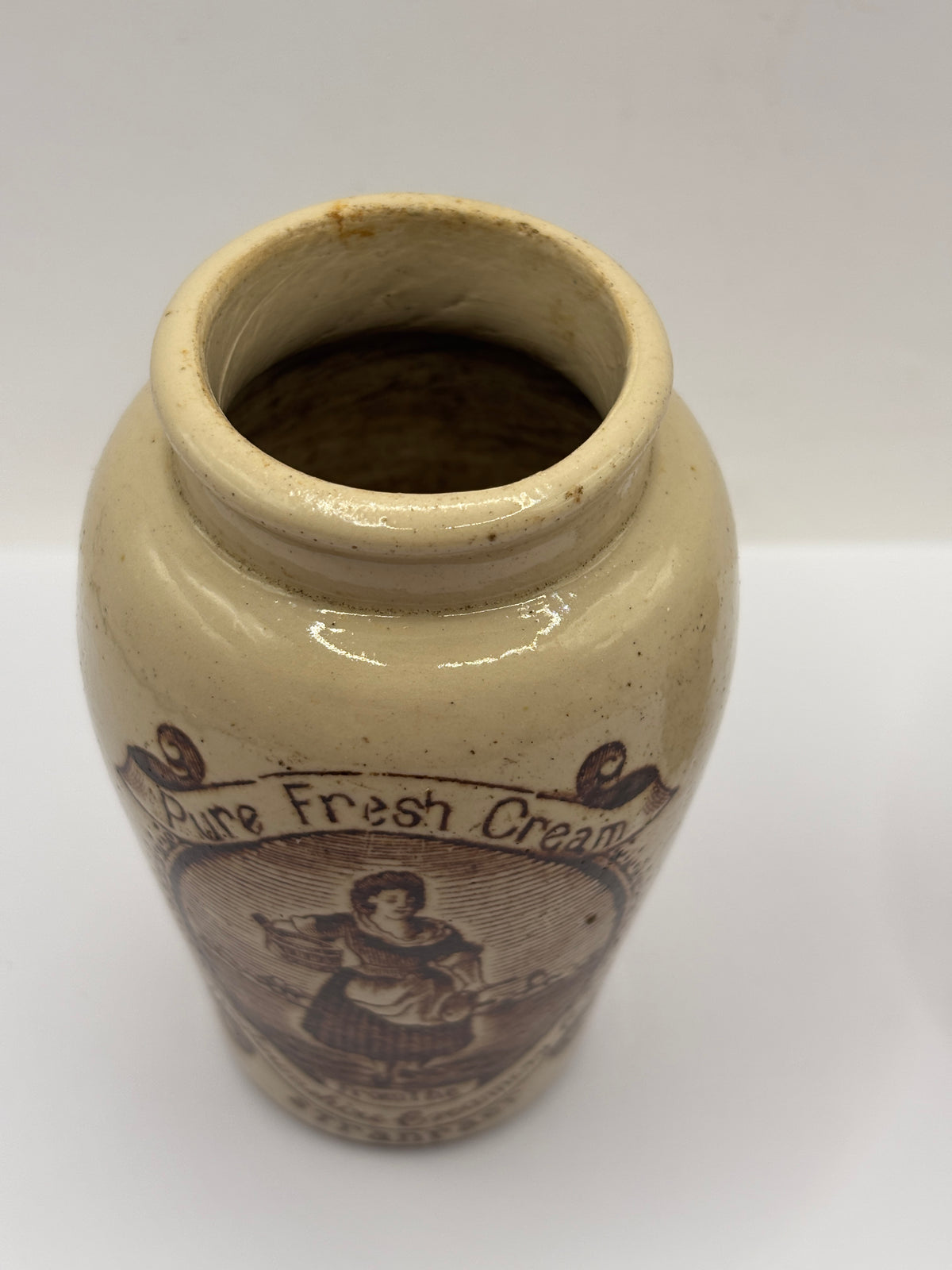 Old advertising cream pot, rich preserved cream stranraer, milkmaid. Serpia print