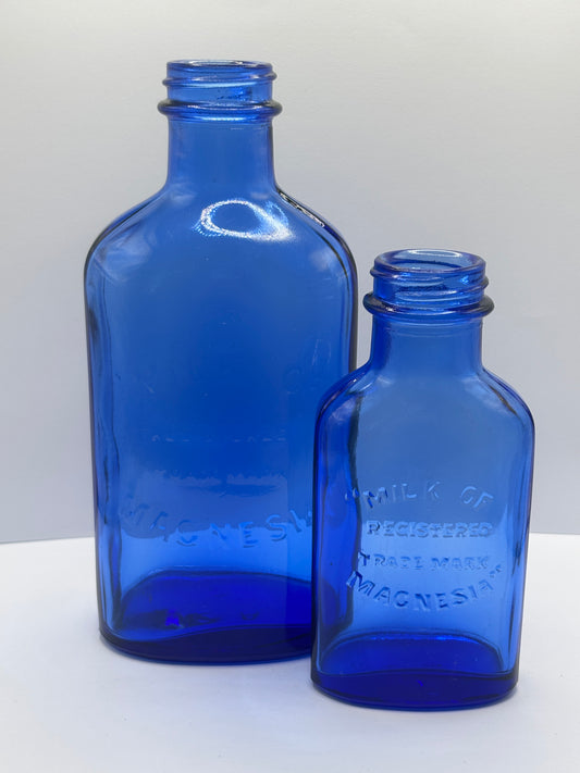 2 vintage Blue milk of magnesia bottles