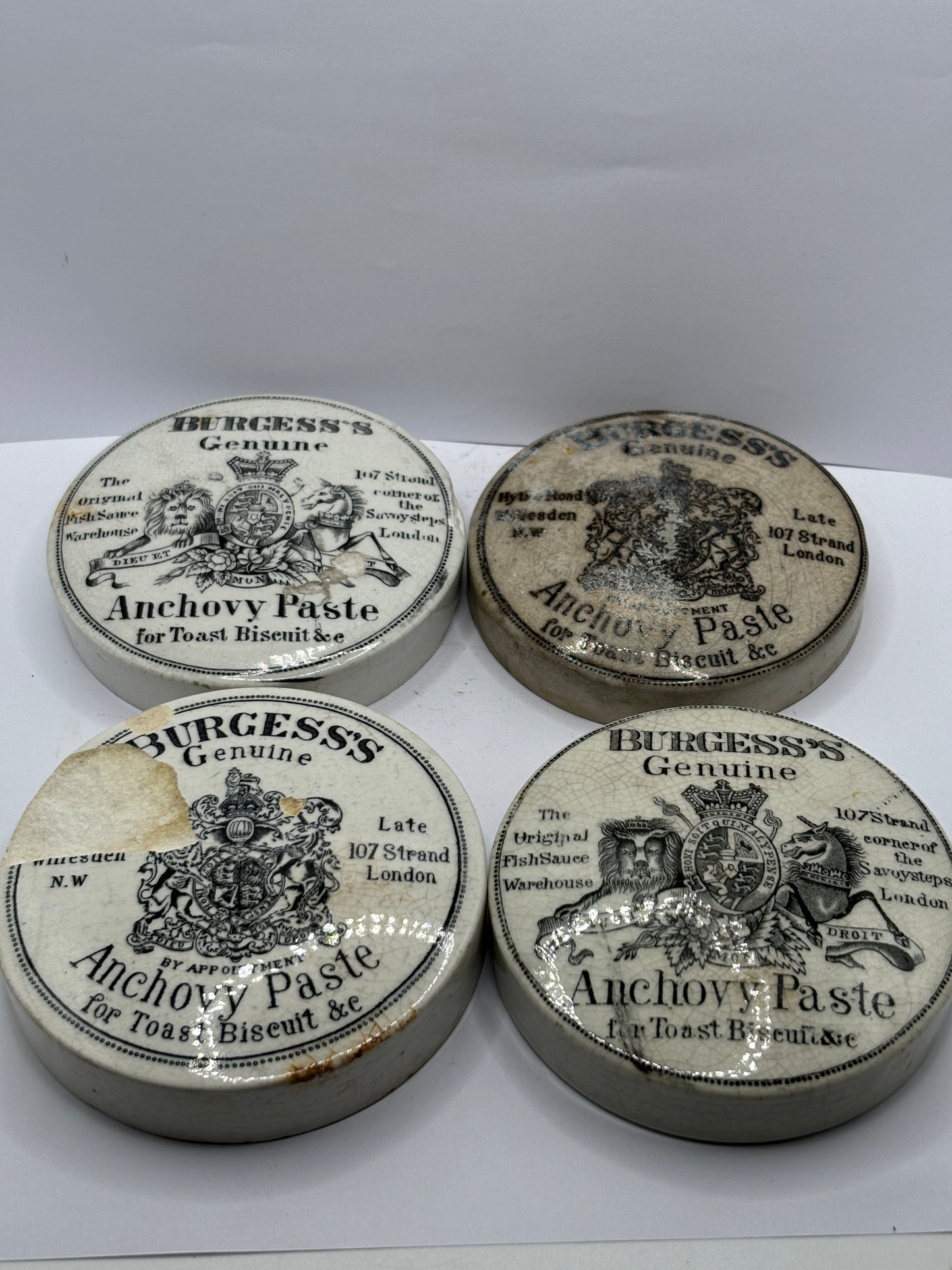 4 damaged advertising lids