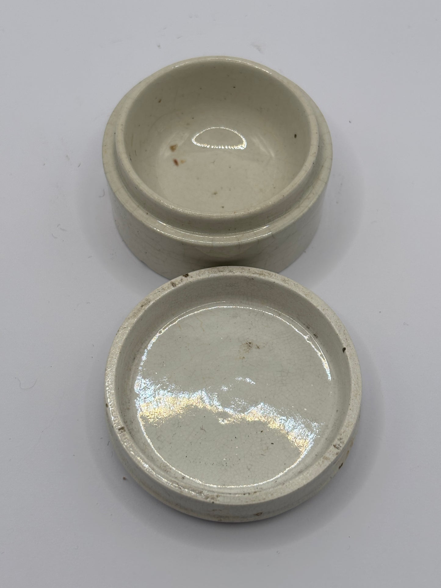 Old stoneware lidded pot. Plain Pot lid and base