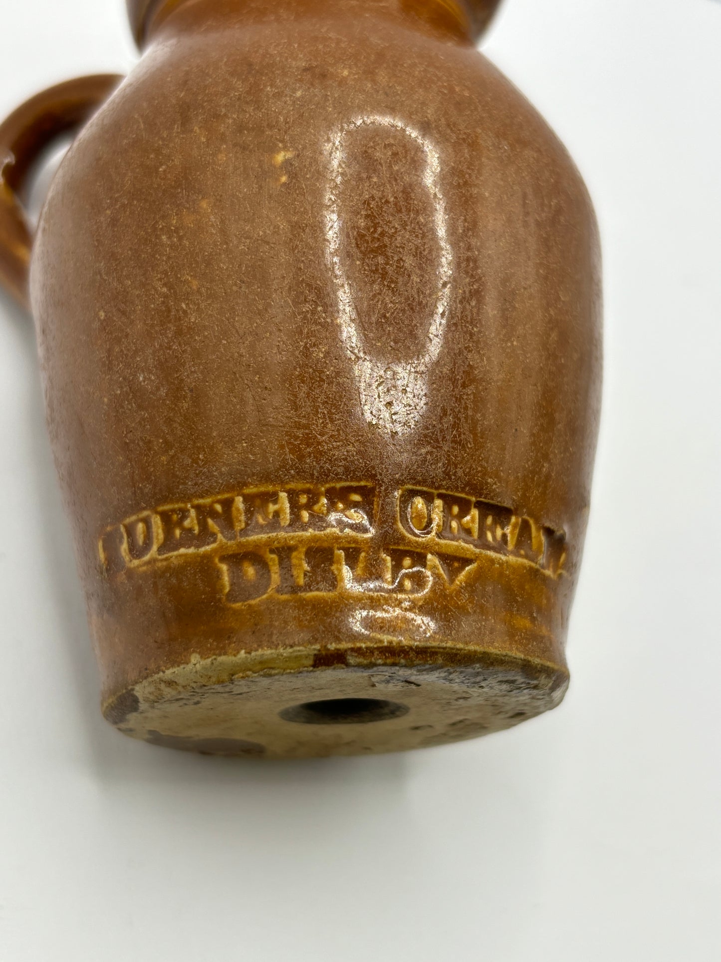 Old stoneware shop display cream pot. Turners cream Disley.