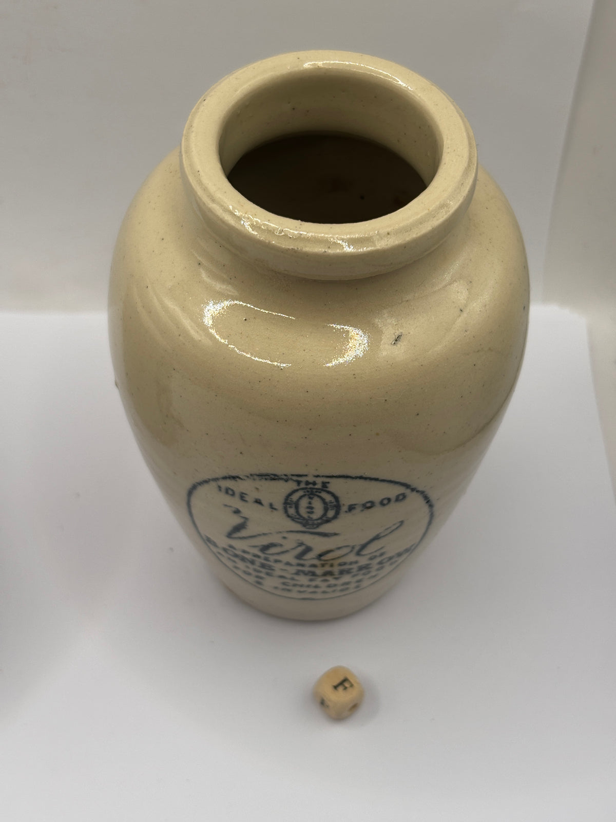 Old advertising stoneware Virol pot, 13.5cms (F)