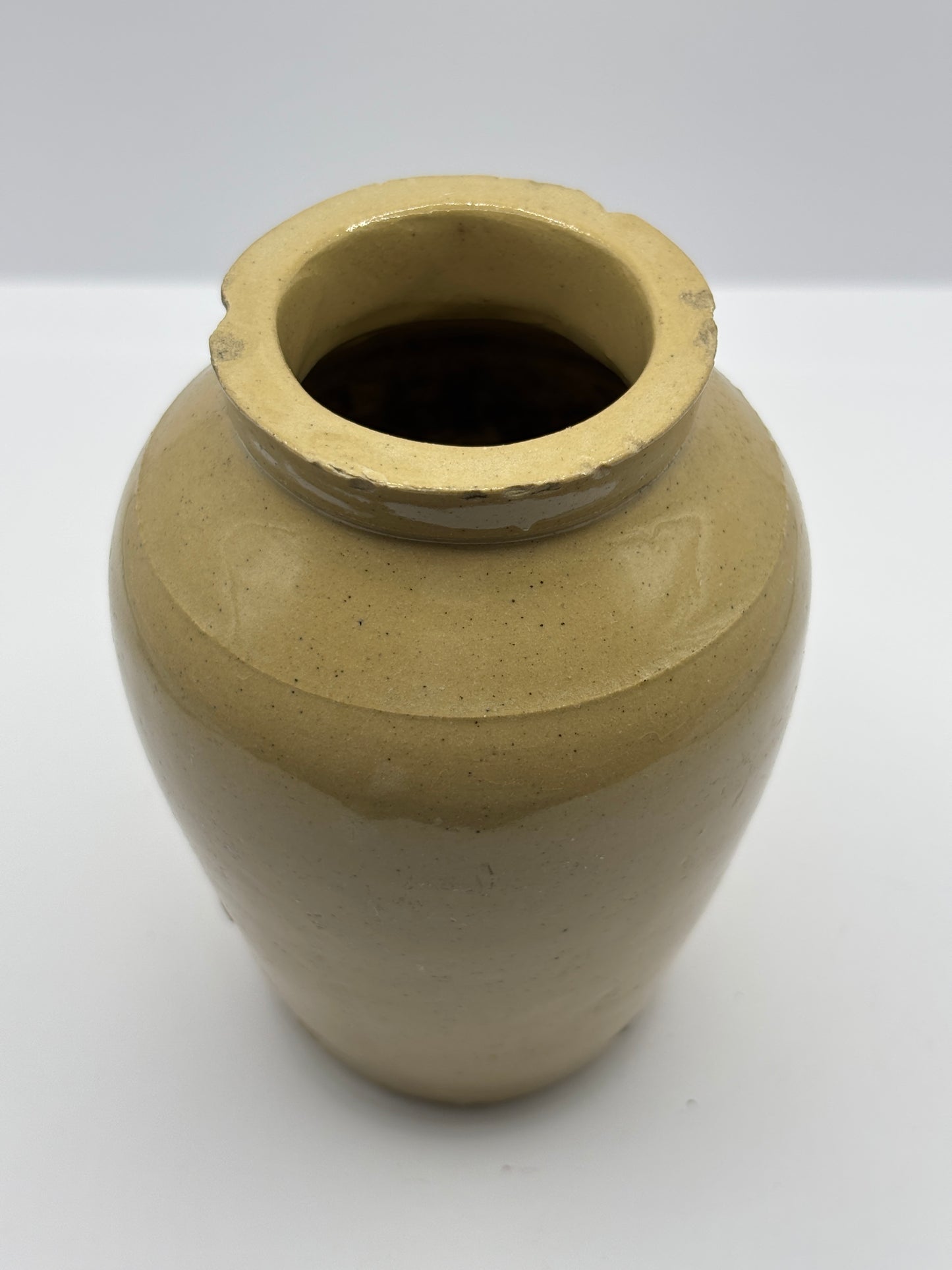 Old plain cream pot, chipped