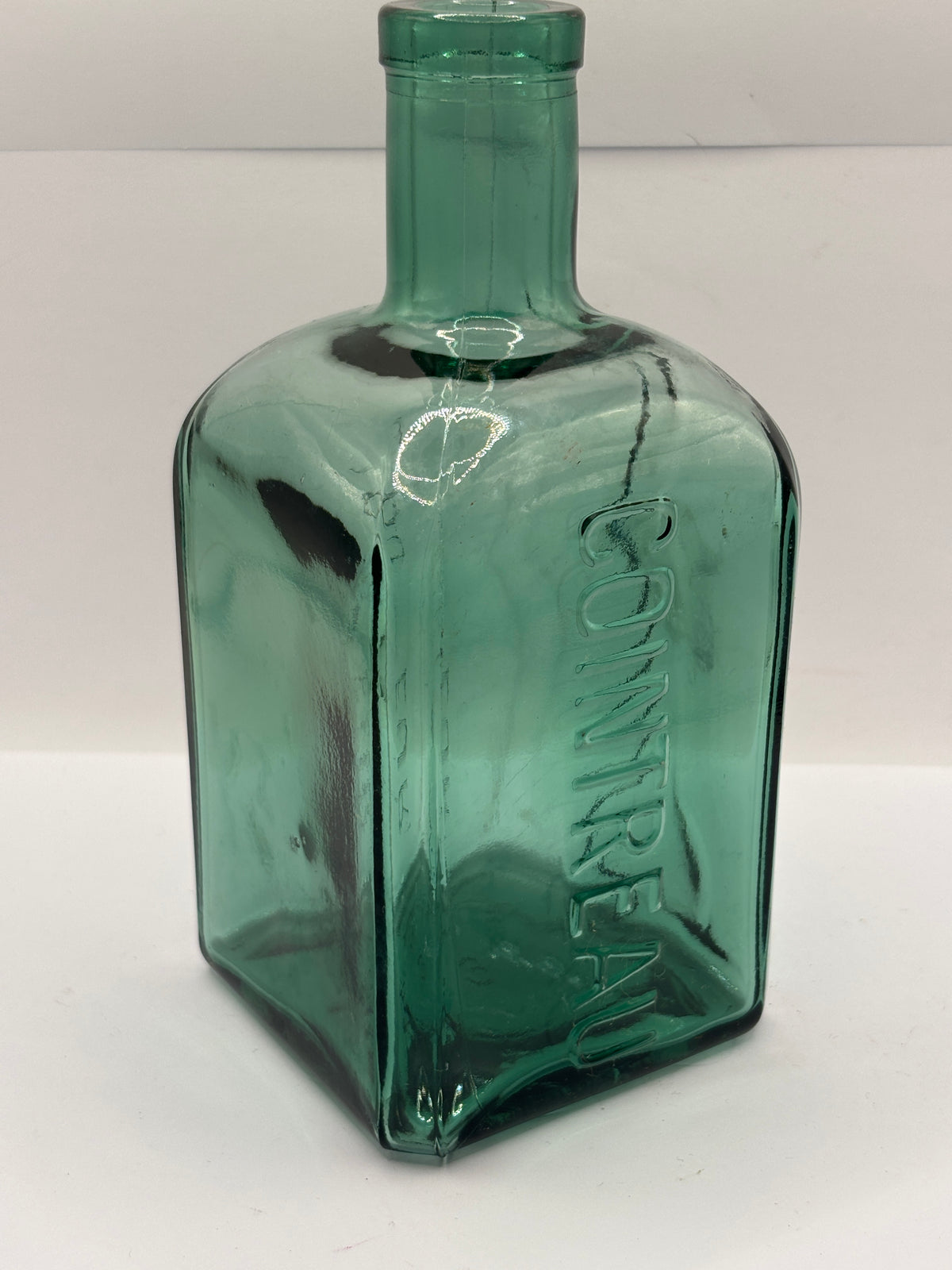 Old green liqueur bottle, contreau