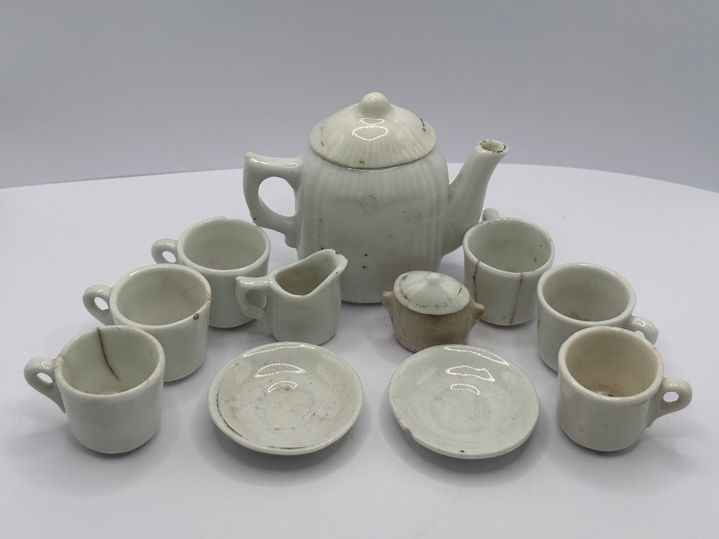 11 piece mini dolls house tea set, damages