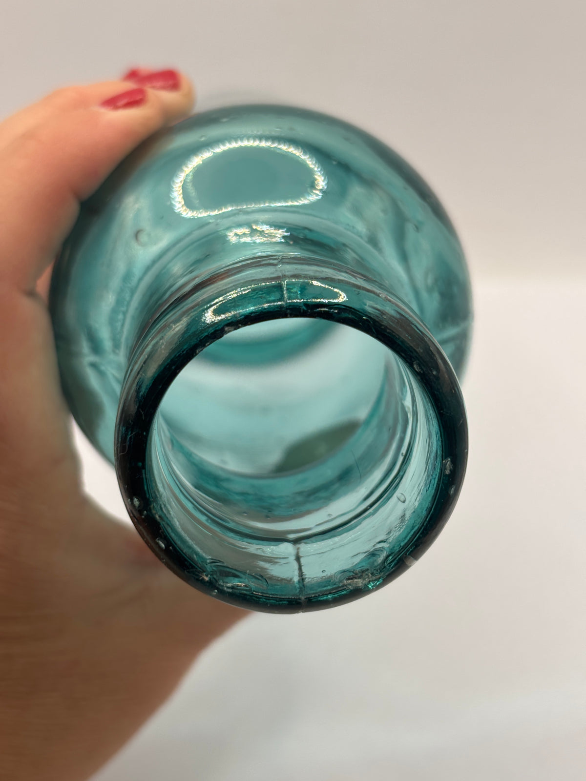 Old dark aqua glass jar