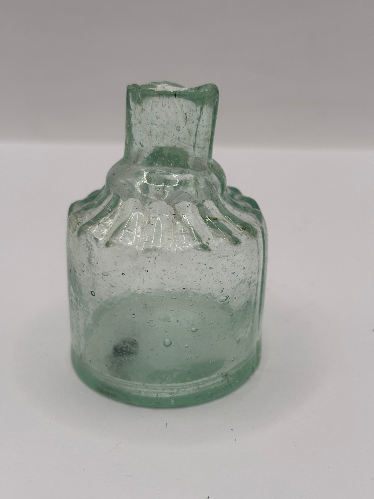 Old aqua glass inkwell, ink bottle. Penny ink